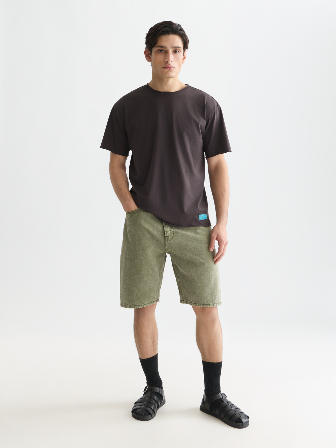 Raw edge Scotch & Soda short sleeve T-shirt with a casual fit and distressed neckline, showcasing a stylish, relaxed design.