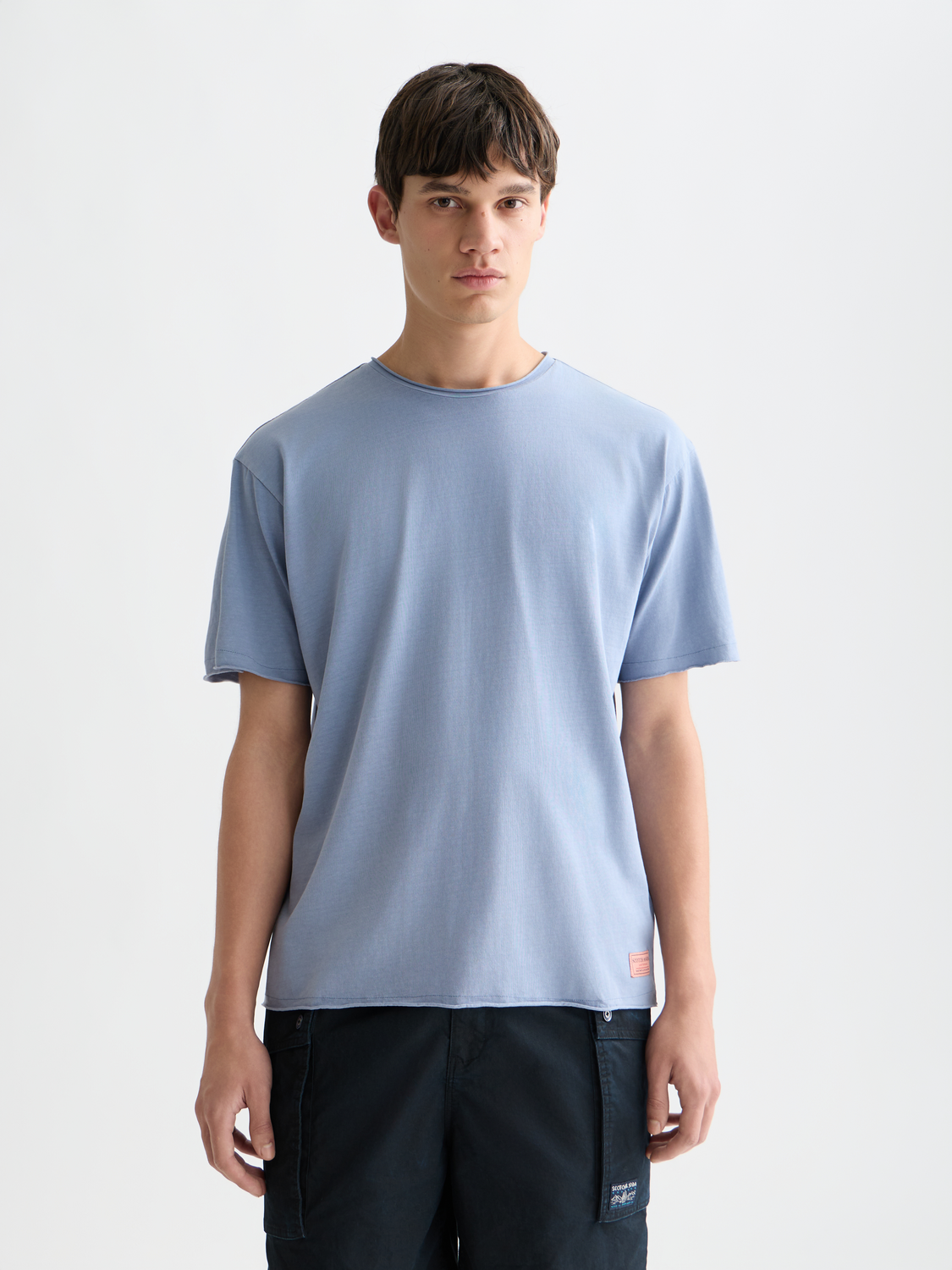 White raw edge short-sleeve T-shirt by Scotch & Soda featuring a relaxed fit and casual style.