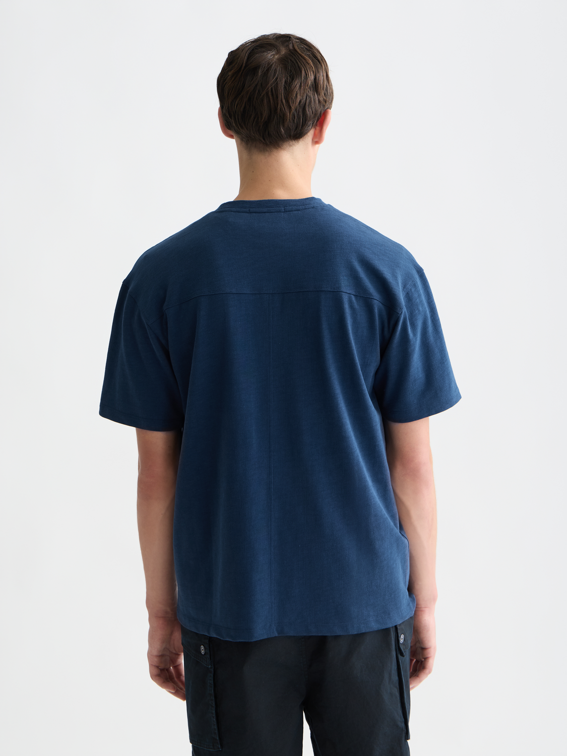 Short sleeve embroidered logo T-shirt by Scotch & Soda, showcasing detailed logo embroidery on the front.