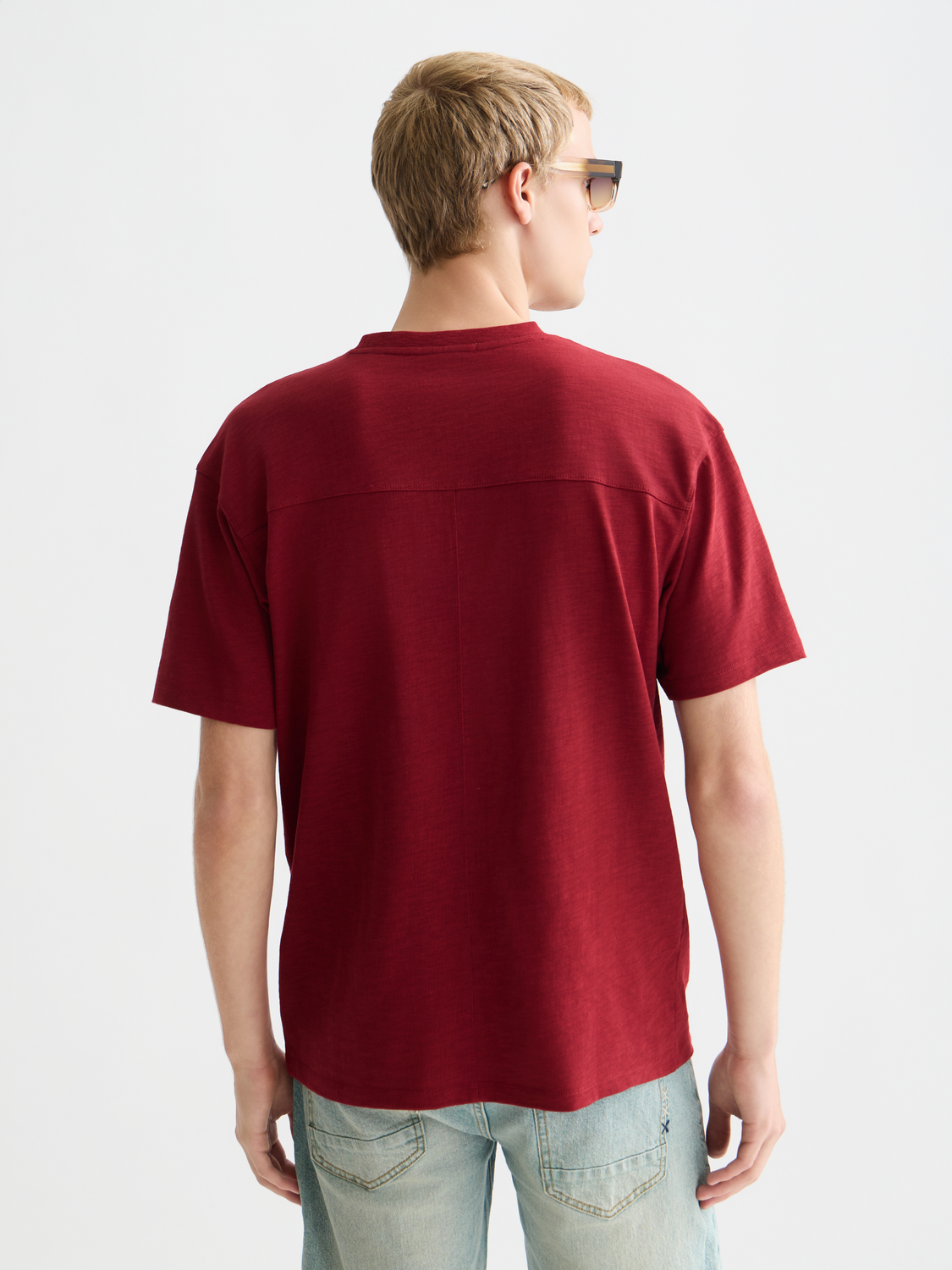 Short sleeve SCOTCH & SODA embroidered logo t-shirt with front chest design, shown from the back in the image.