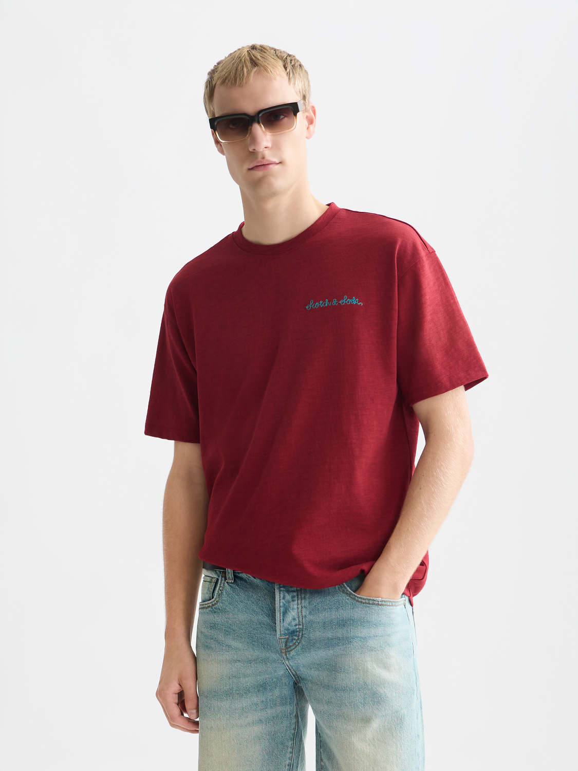 Short sleeve Scotch & Soda embroidered logo T-shirt with a front design, casual fit, and soft fabric in a neutral color.