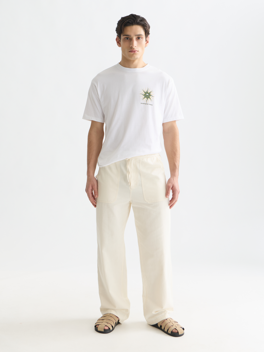 SCOTCH & SODA artwork short-sleeve T-shirt featuring vibrant graphic design and casual fit on a plain background.