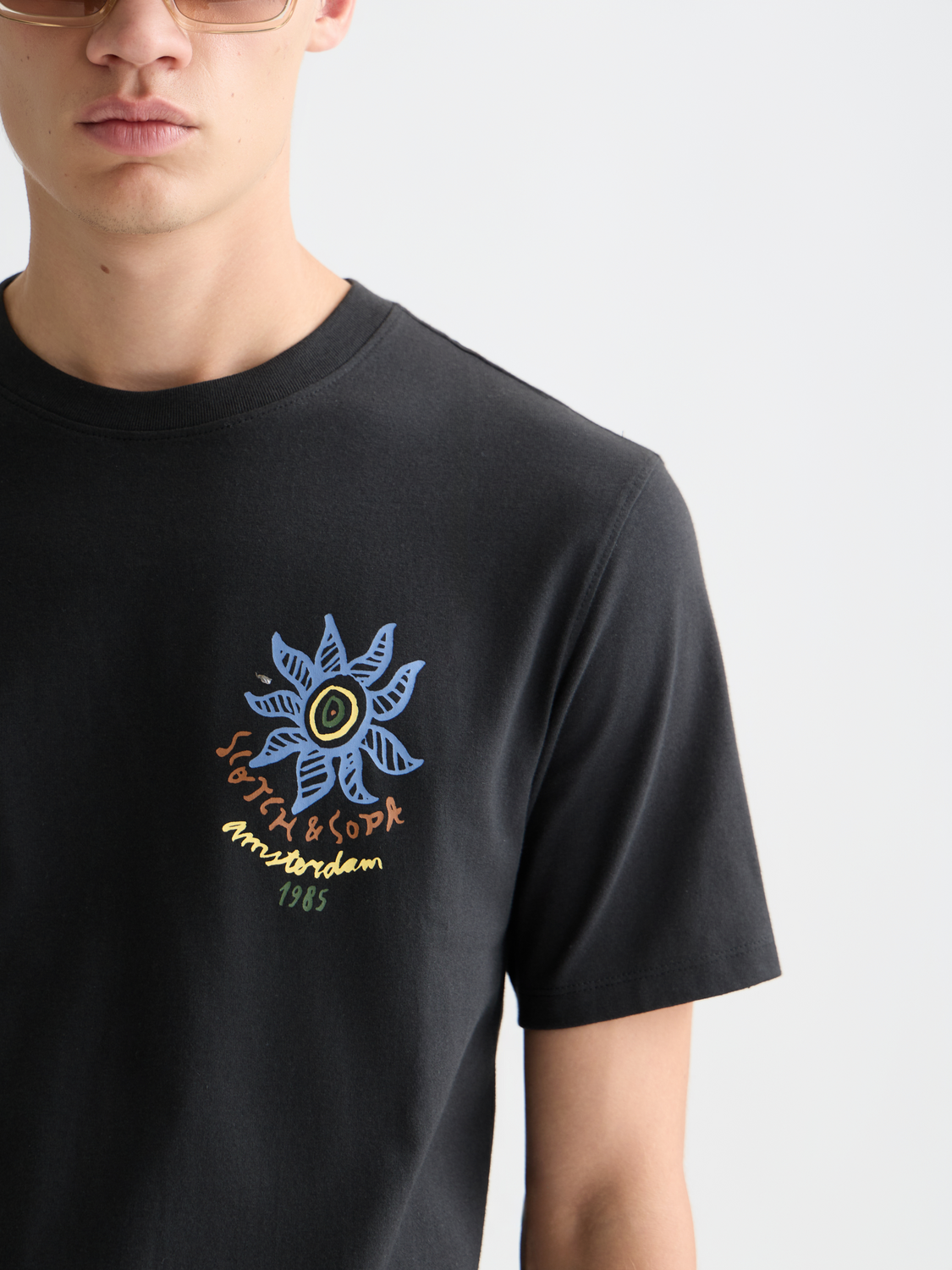SCOTCH & SODA artwork short sleeve t-shirt featuring a colorful graphic design on soft cotton fabric.