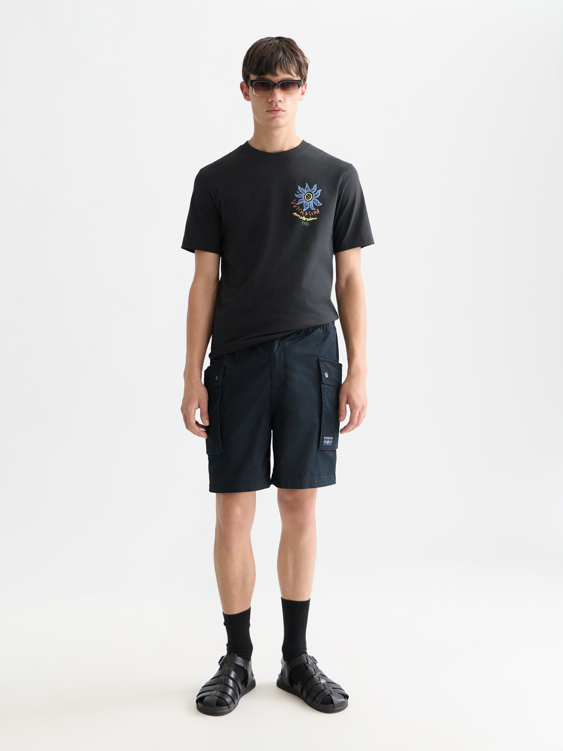 Scotch & Soda short sleeve artwork t-shirt featuring vibrant graphic print on front, casual design, and comfortable fit.