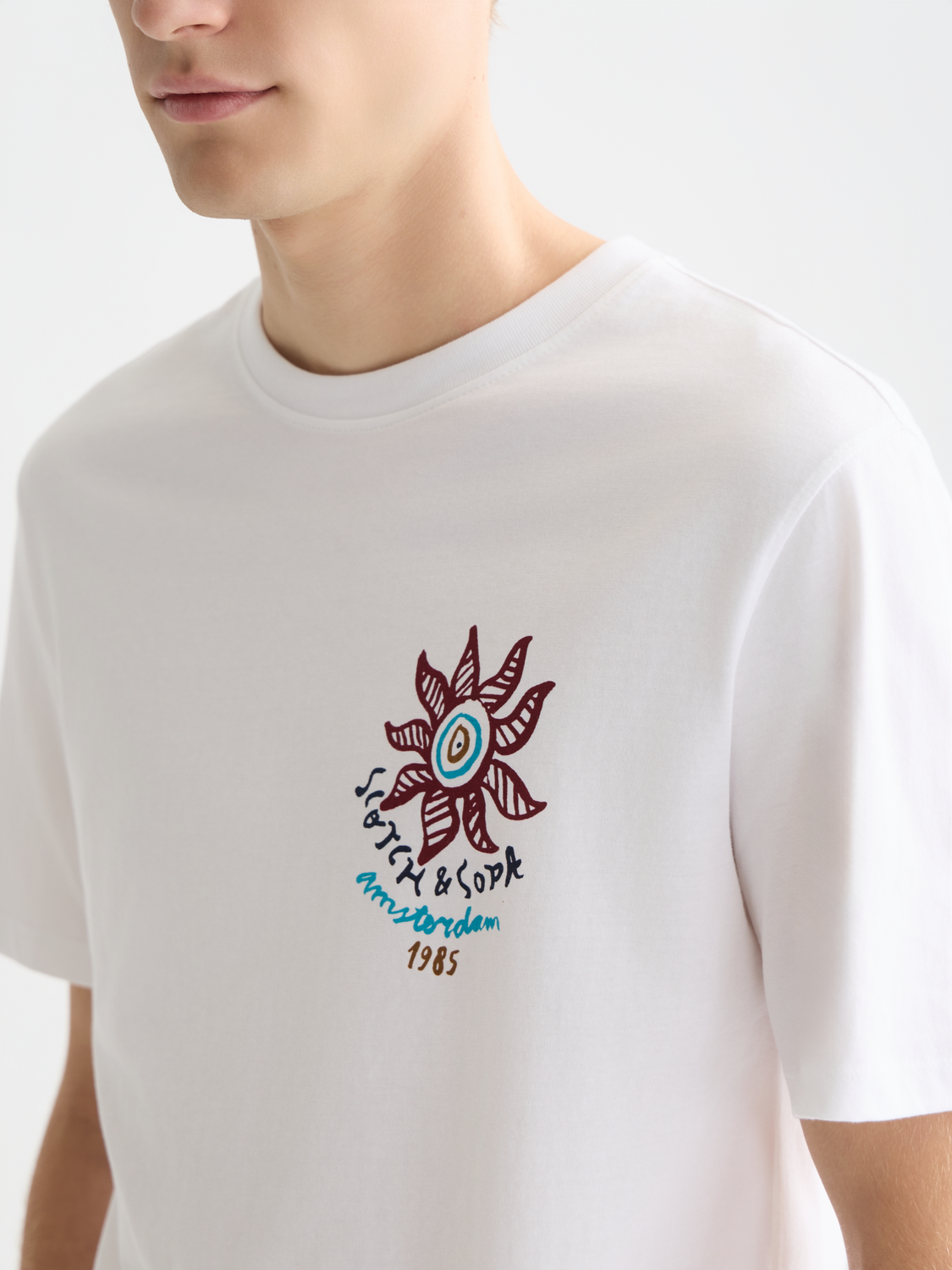 SCOTCH & SODA artwork short sleeve t-shirt featuring colorful graphic design and casual fit, displayed on a plain background.