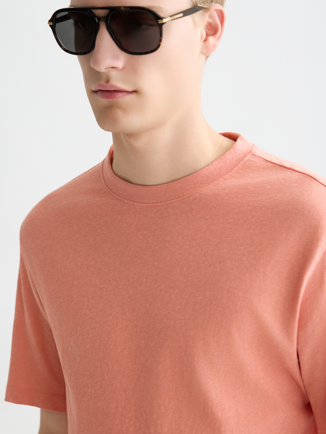 Cotton-linen short-sleeve T-shirt by Scotch & Soda with a relaxed fit and casual style, shown in natural fabric detail.