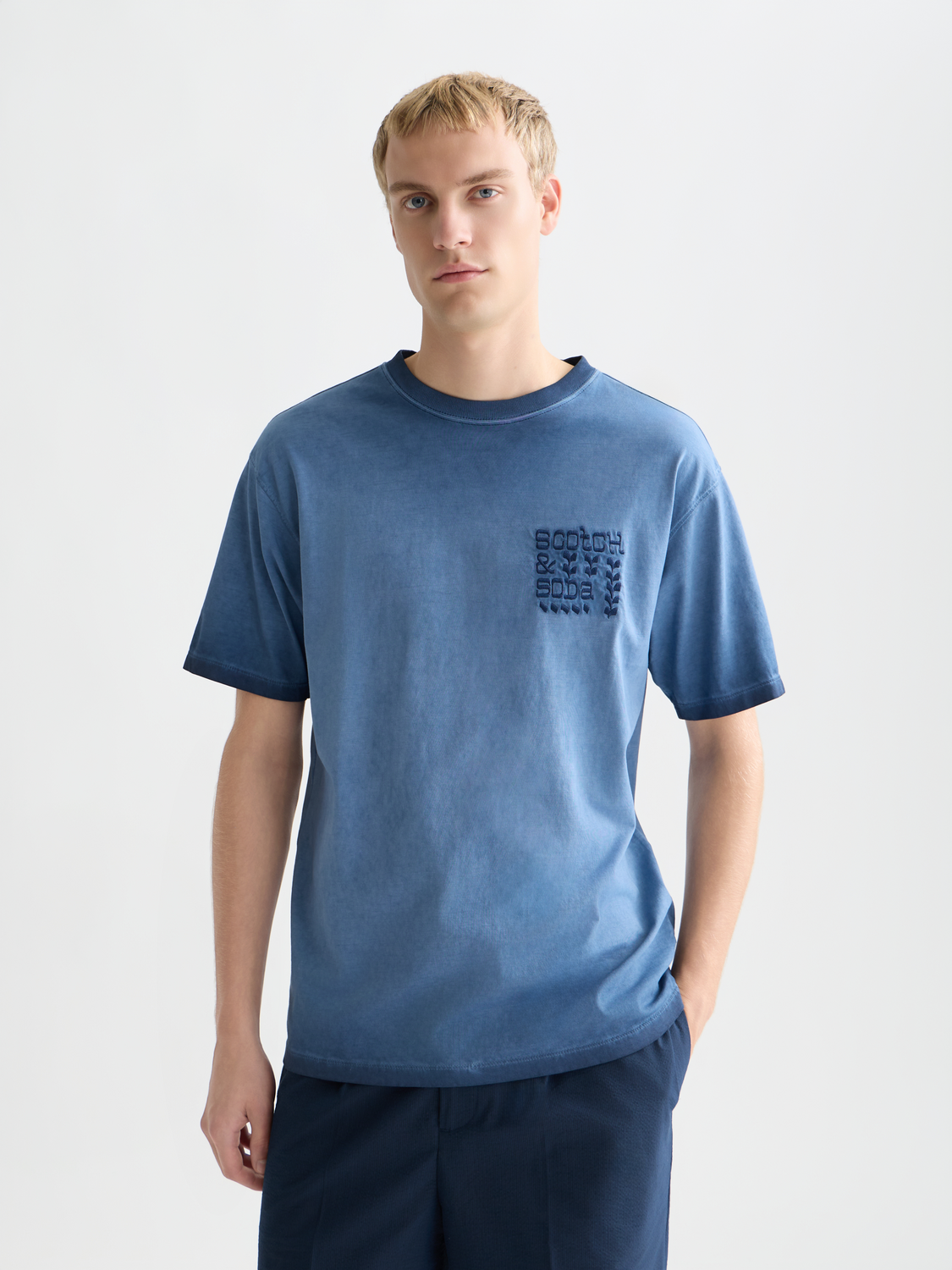 Short sleeve Scotch & Soda artwork t-shirt with colorful graphic print on front, casual men's fashion tee.
