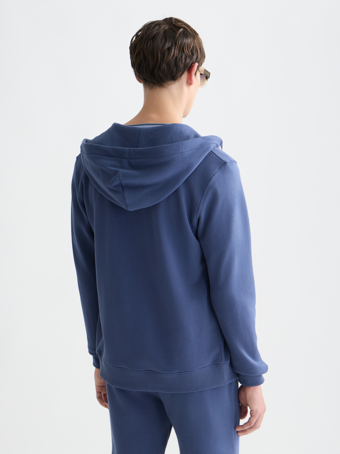 Black Scotch & SODA zip-through logo hoodie with front zipper and logo detail, shown from the back.