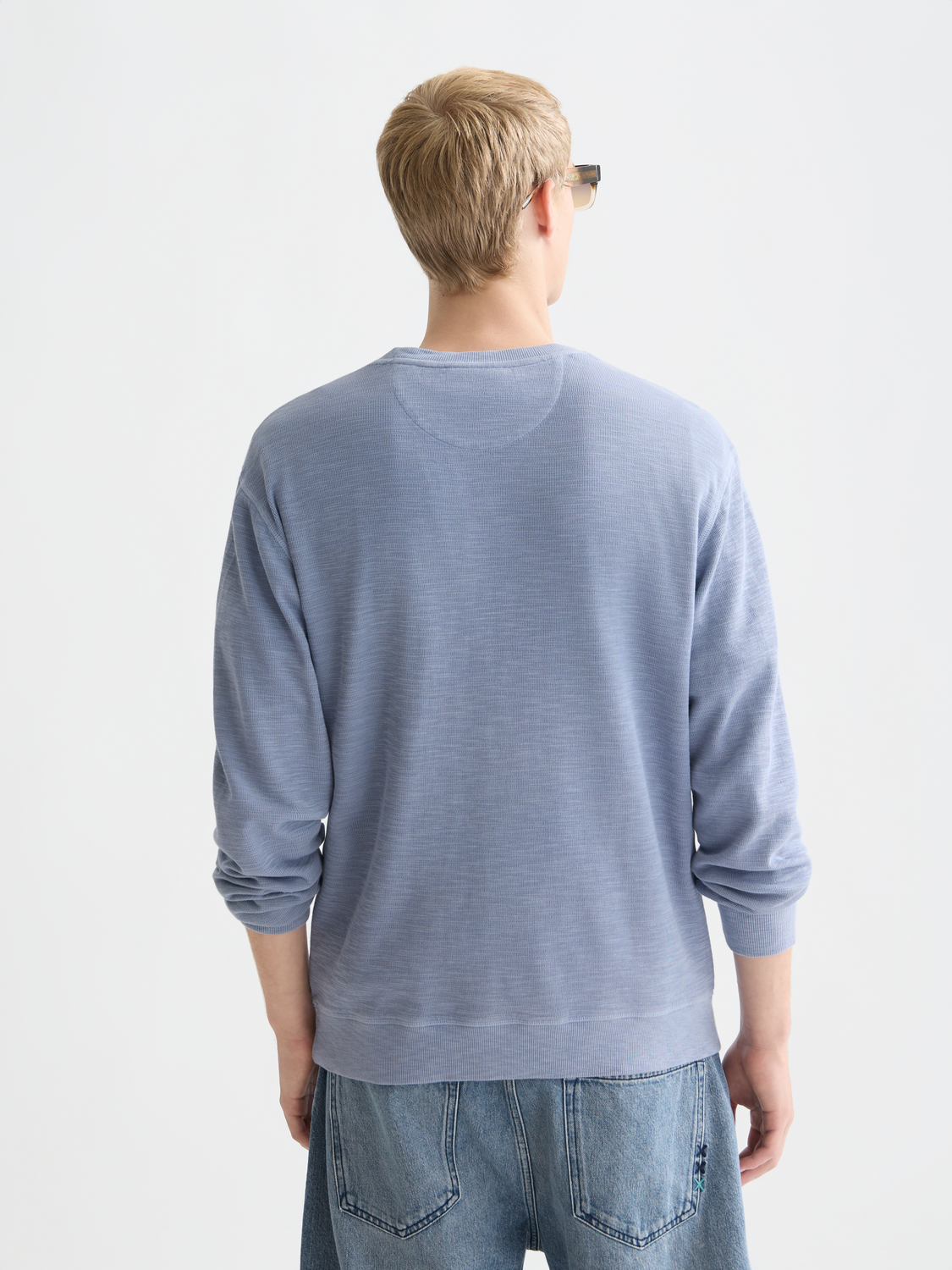 Scotch & Soda garment-dyed sweatshirt in soft fabric, shown from the back with a relaxed fit and subtle color variation.