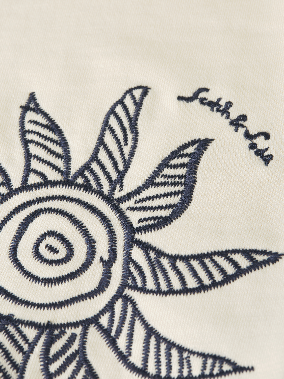 Embossed embroidered sweatshirt from Scotch & Soda featuring detailed stitching, soft fabric, and a relaxed fit.
