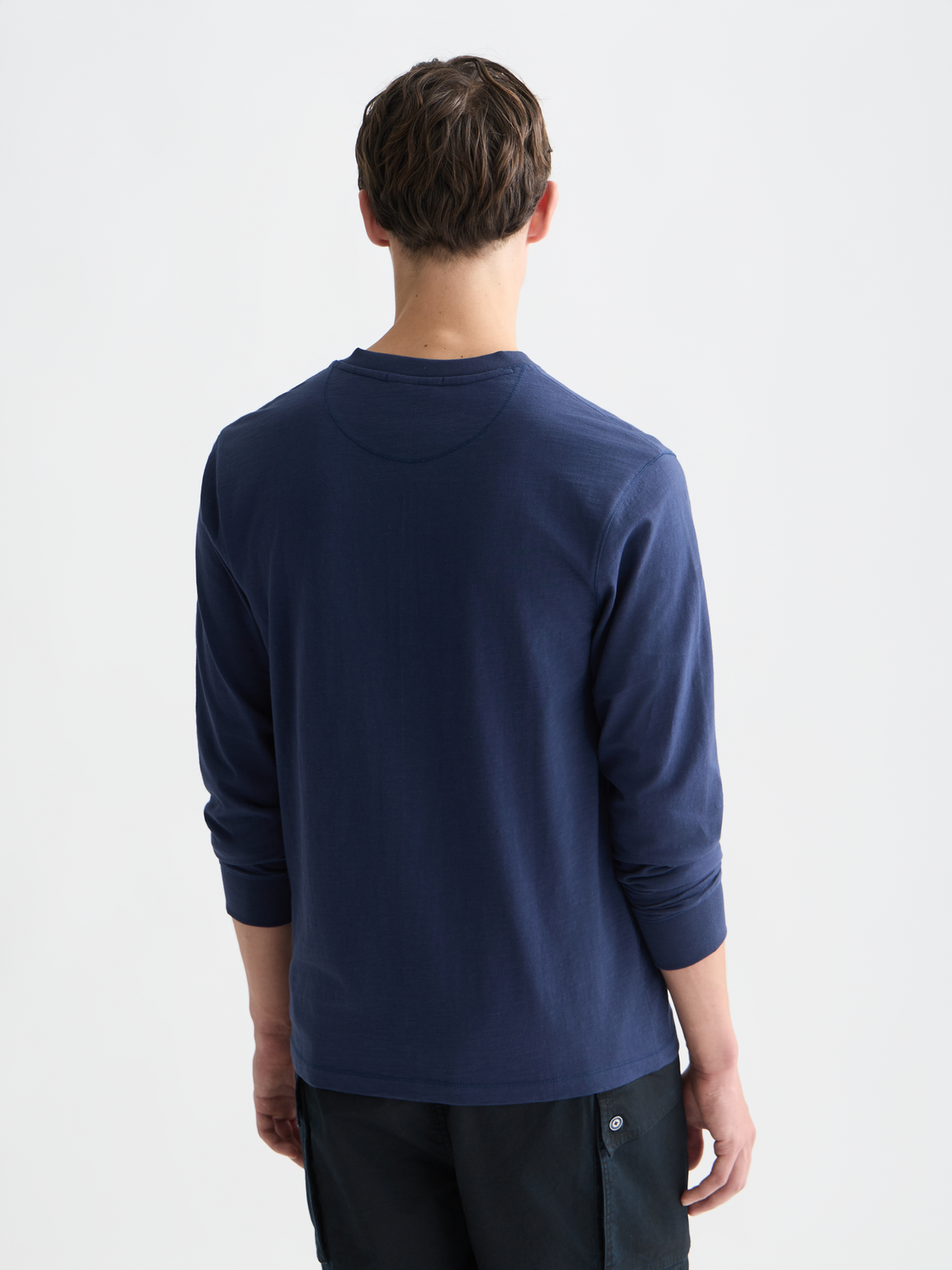 Long sleeve Scotch & Soda Slub Henley T-shirt with button placket, shown from the back in dark color.