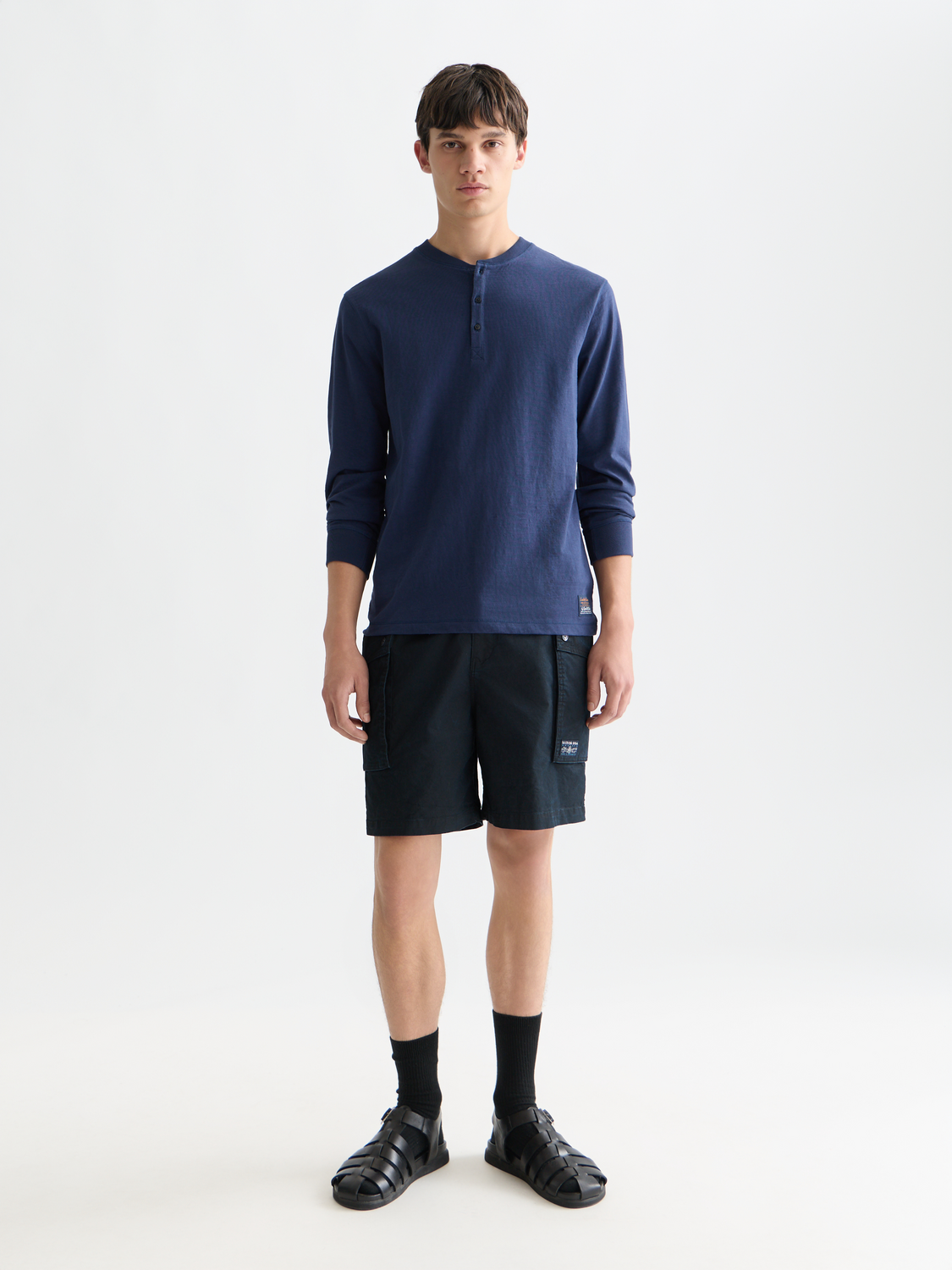 Long sleeve Scotch & Soda Slub Henley T-shirt in neutral color, featuring a buttoned neckline and textured fabric.
