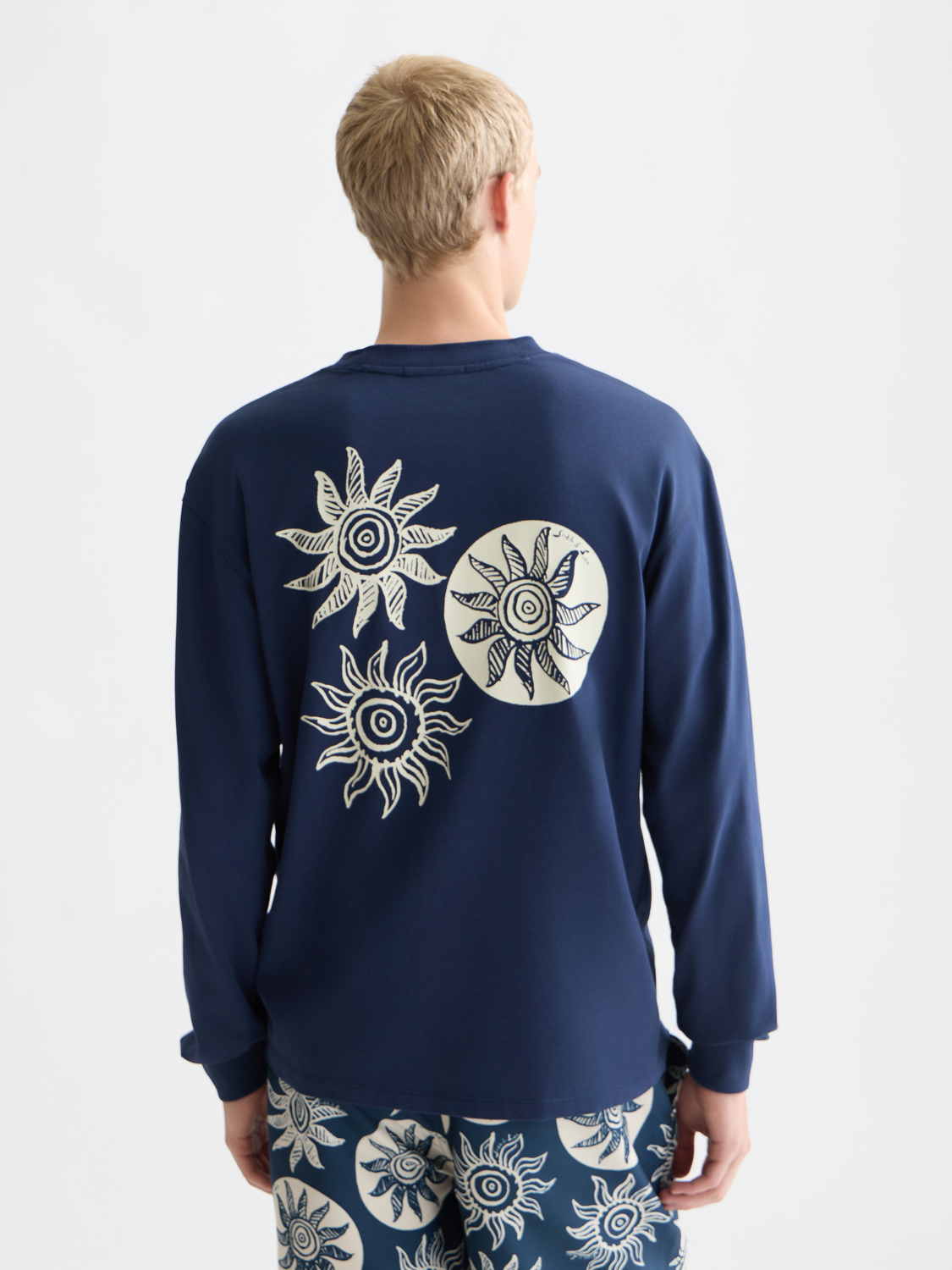 Long sleeve Scotch & Soda artwork T-shirt with colorful graphic design on the back.