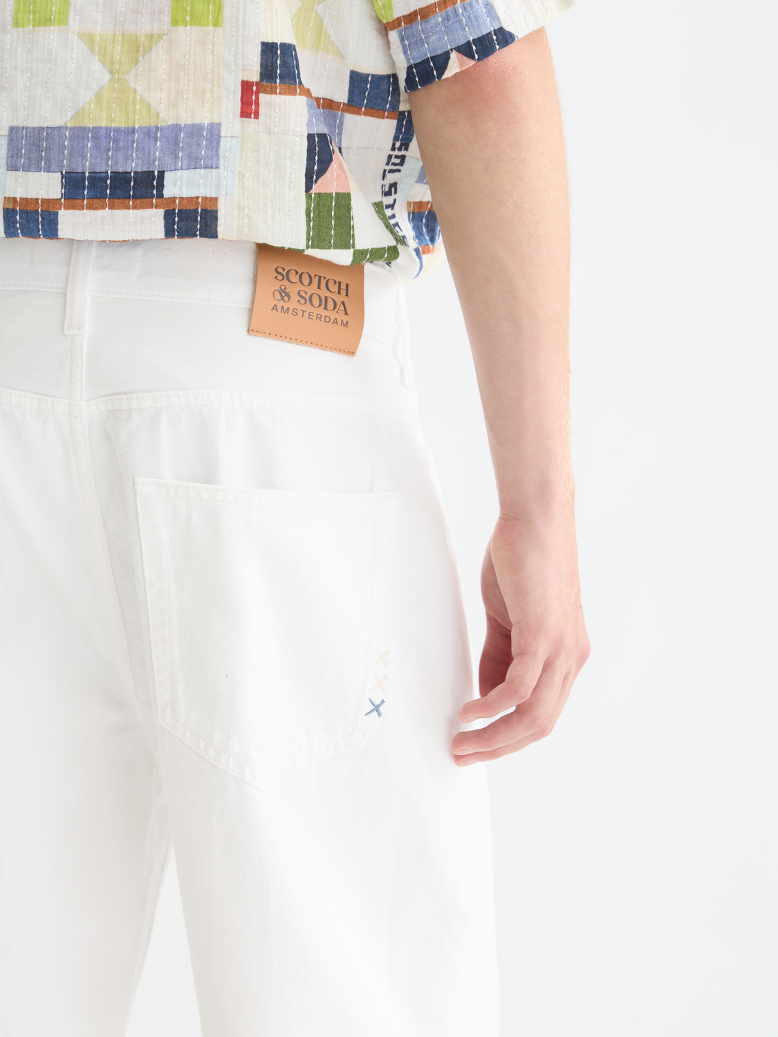 Denim shorts from Scotch & Soda, loose-fit pitch style with a casual design, shown in the product image.
