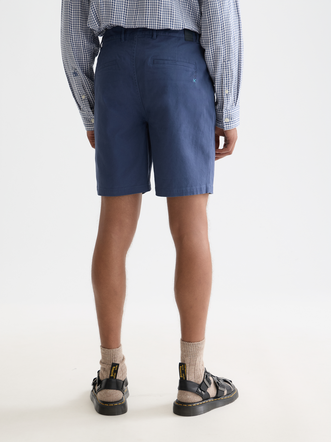Scotch & Soda Stuart chino shorts in a classic beige color, shown from the back with a tailored fit and belt loops.