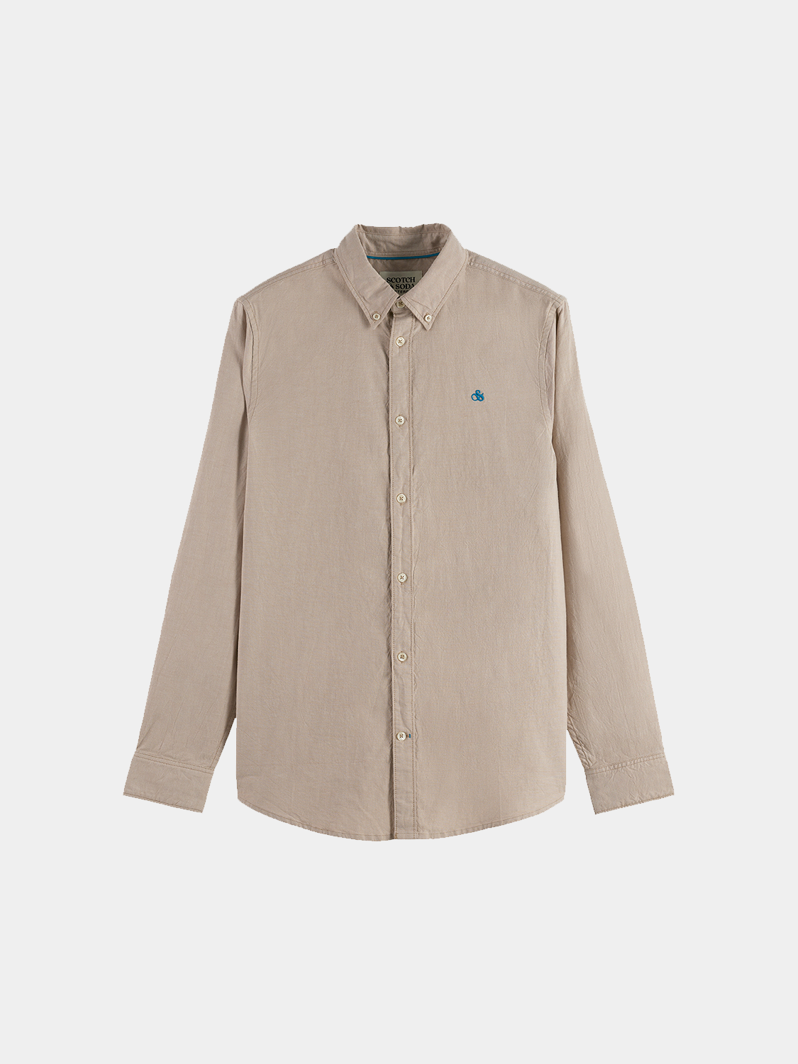 Long-sleeve Scotch & Soda Oxford shirt in light blue with a classic collar and button front, hanging on a wooden hanger.