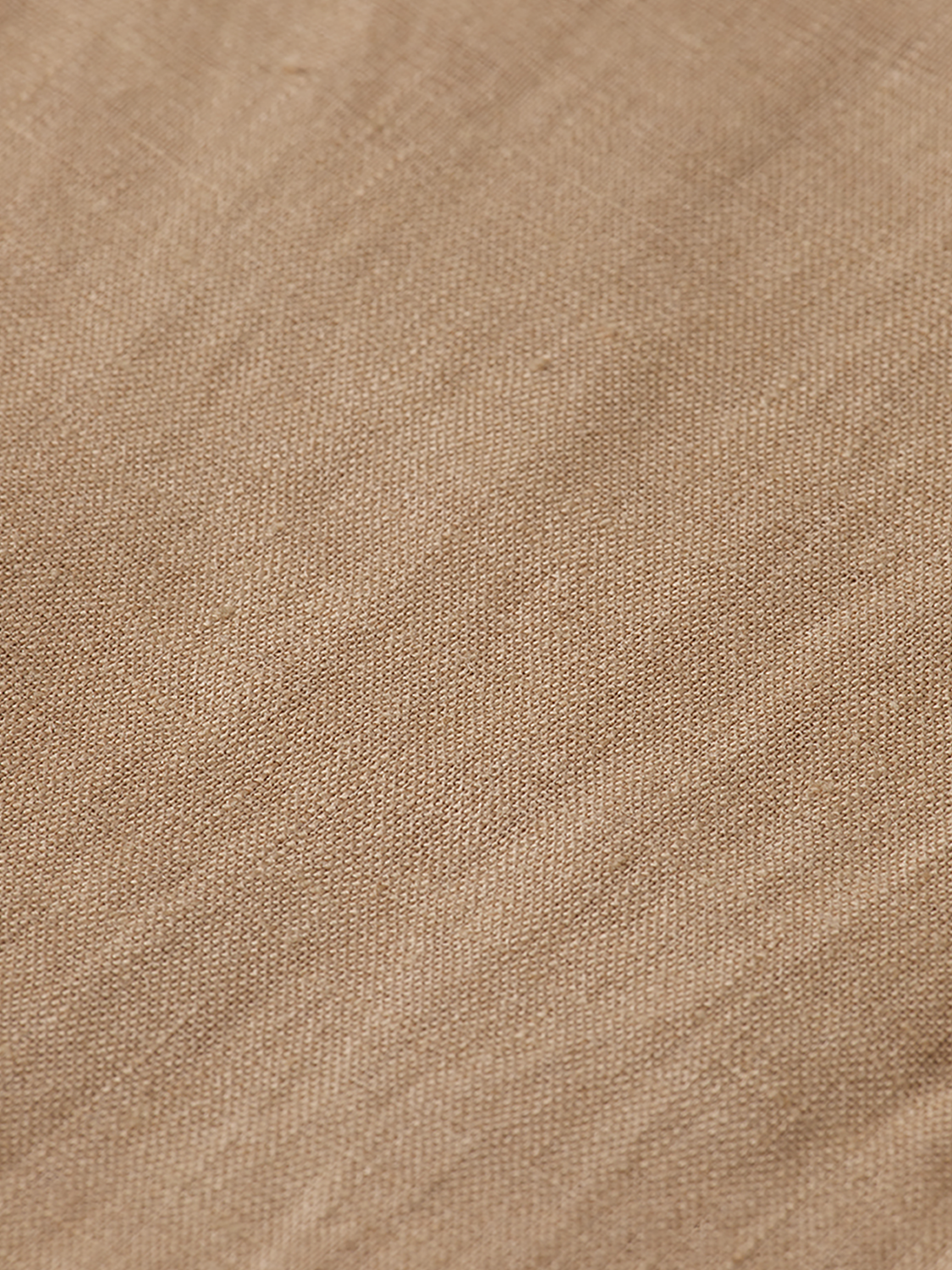 Long sleeve linen shirt from Scotch & Soda, featuring a relaxed fit and natural fabric, displayed on a hanger.