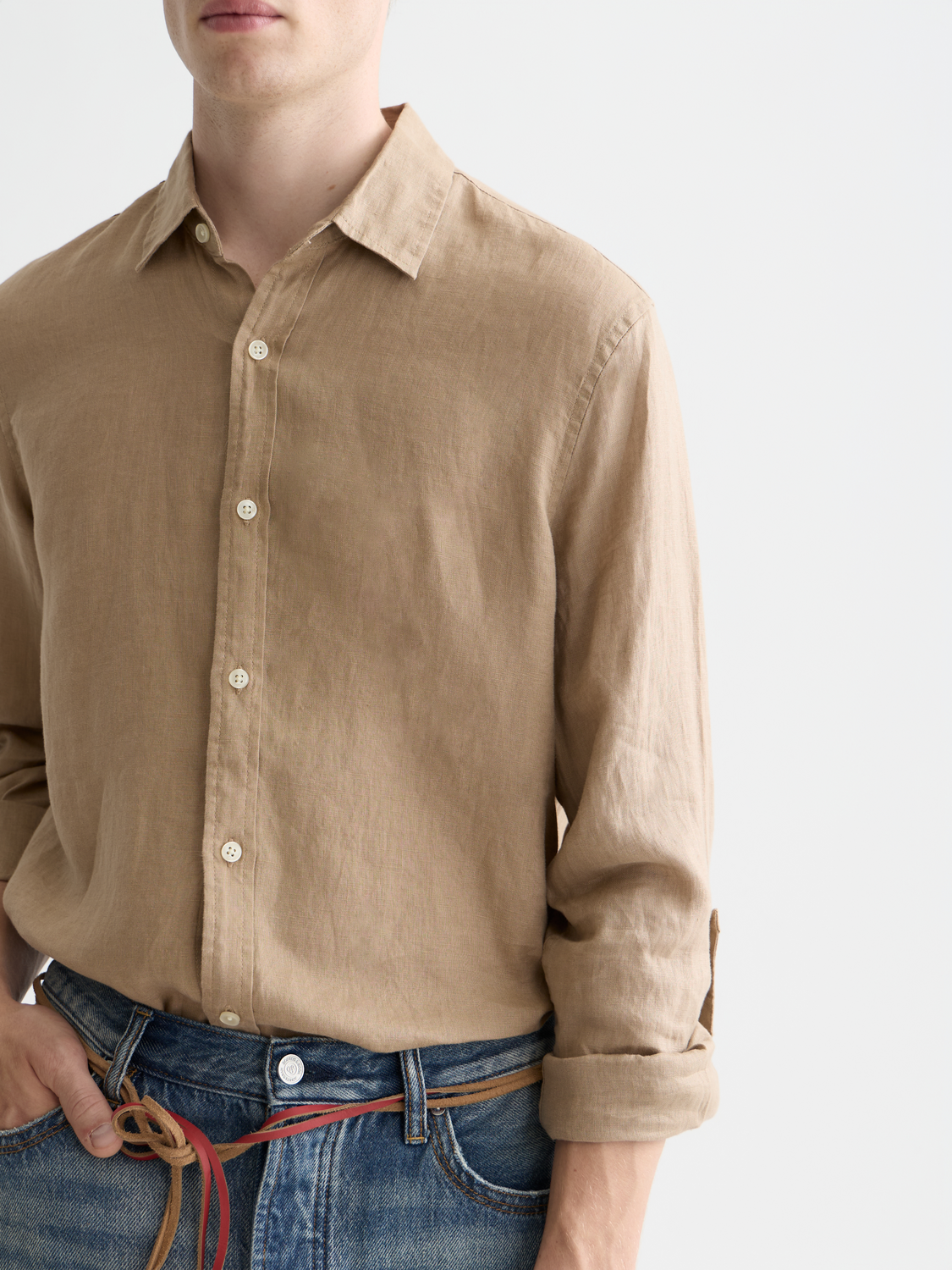 Light beige Scotch & Soda long sleeve linen shirt with a collar and button front, shown flat on a white background.