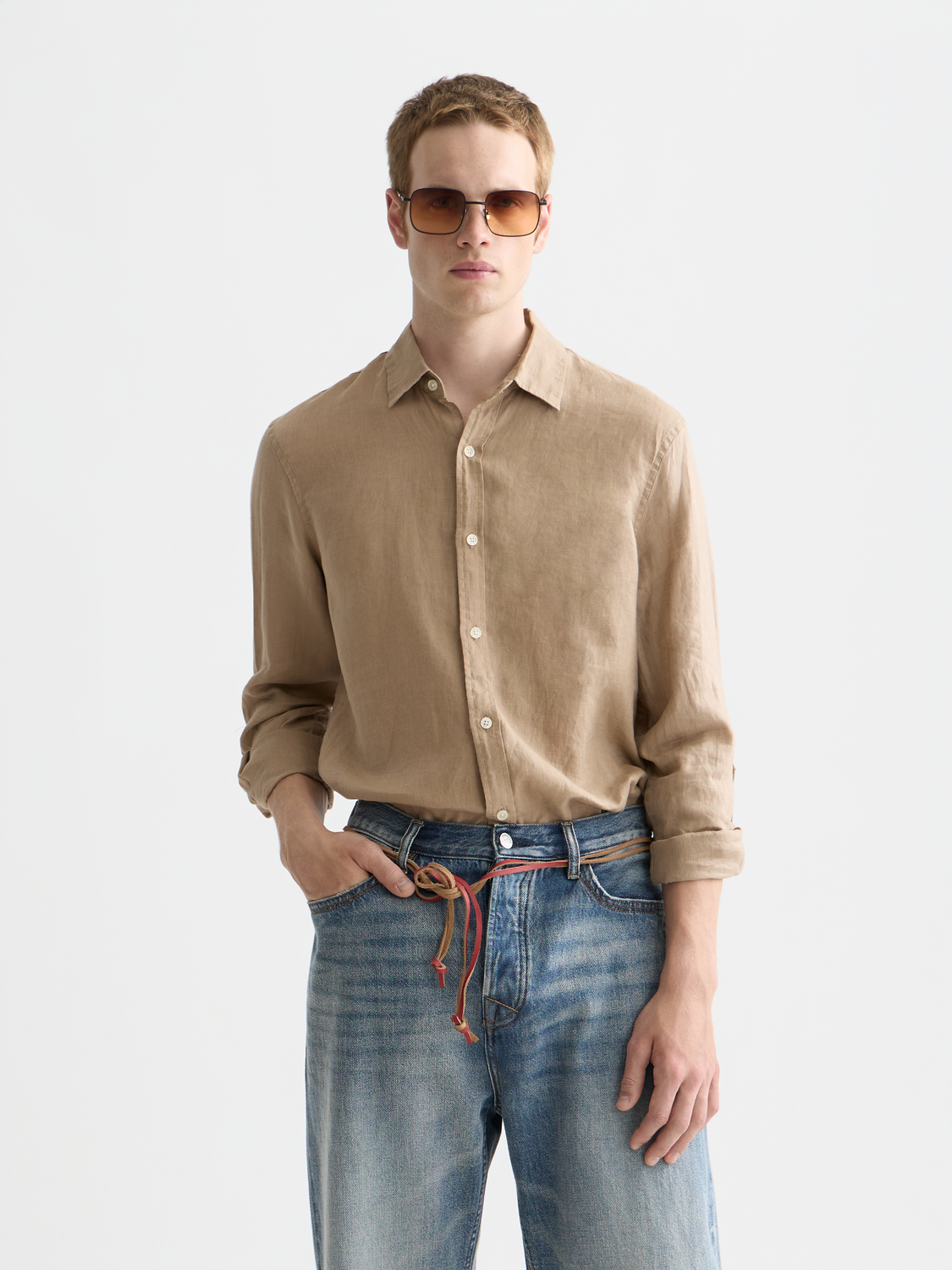 Long-sleeve linen shirt by Scotch & Soda, showing a lightweight, breathable fabric with a button-up front and classic collar.