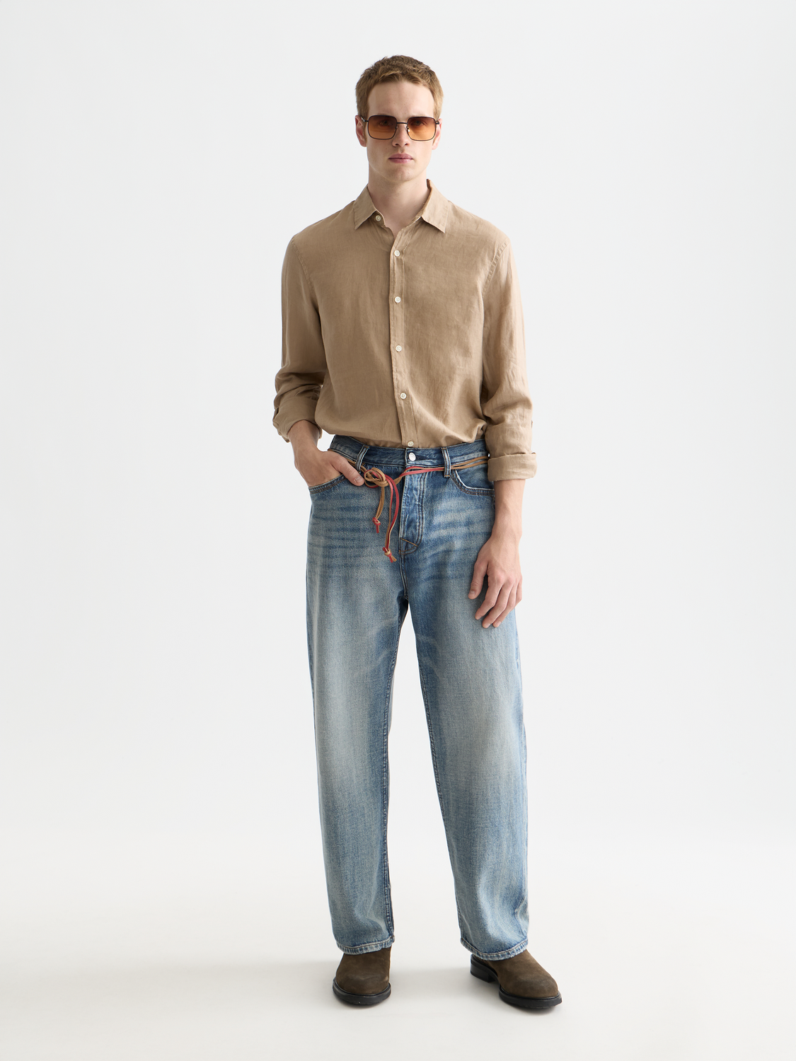 Light blue Scotch & Soda long-sleeve linen shirt, showing a close-up of the fabric and collar detail.