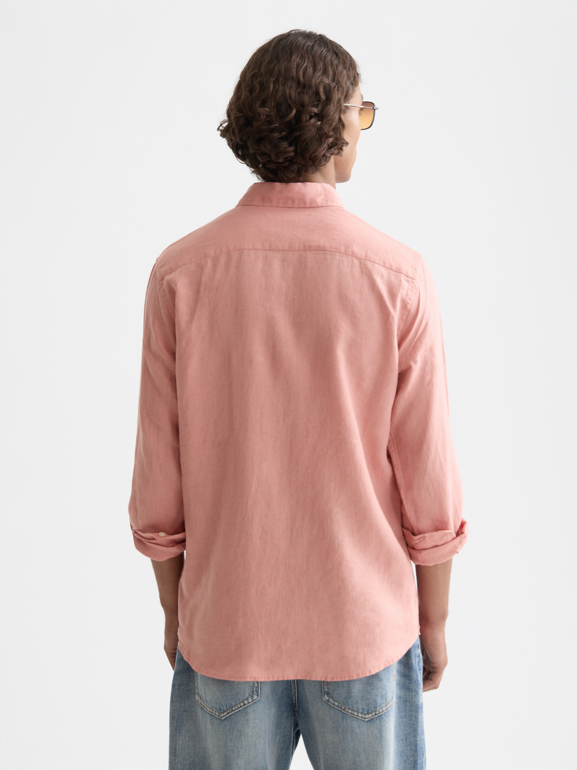 Long-sleeve linen shirt by Scotch & Soda, shown from the back with a classic fit and natural fabric texture.