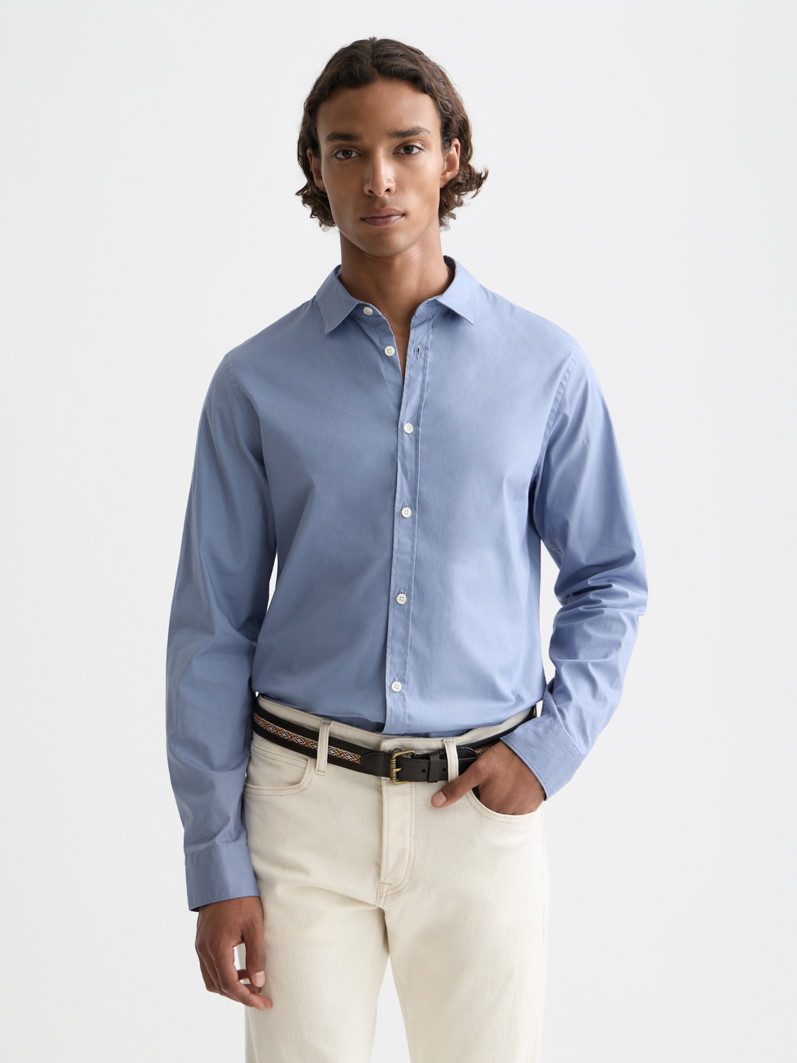 Long-sleeve Scotch & Soda poplin shirt in light fabric with a classic collar and button front, displayed on a hanger.