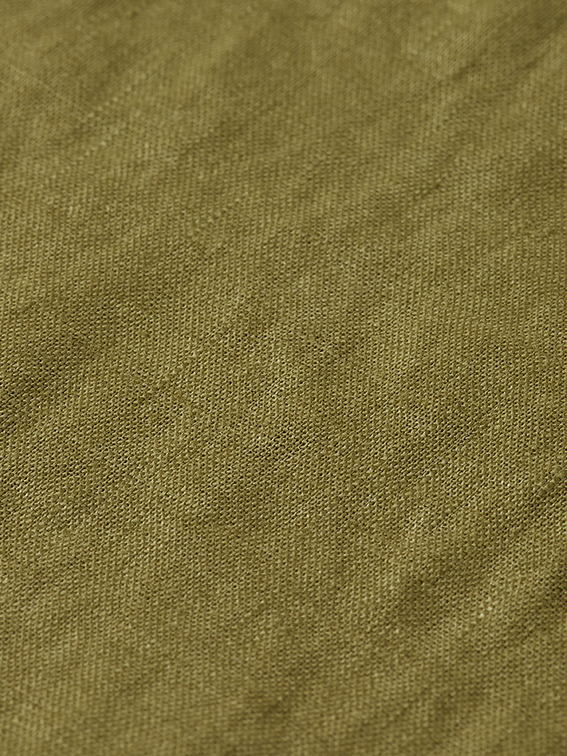 Light beige short-sleeved linen shirt by Scotch & Soda, showing a relaxed fit and button-up front.