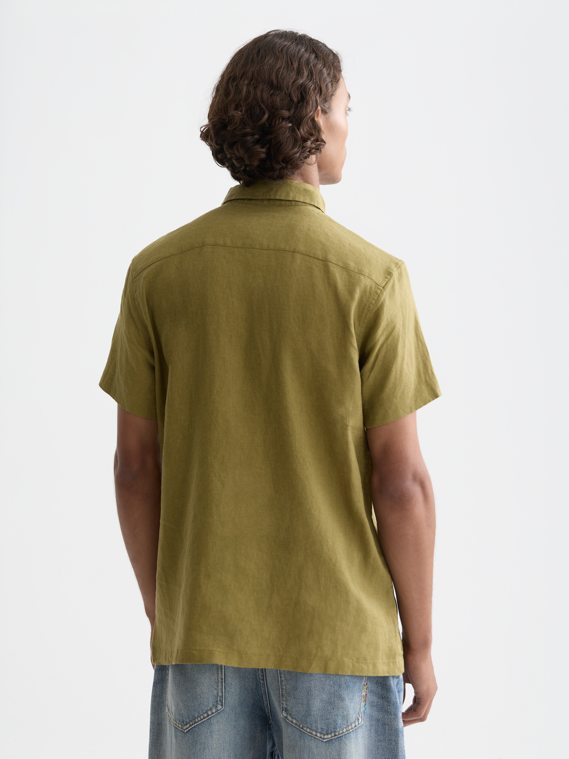 Short-sleeved linen shirt by Scotch & Soda, featuring a relaxed fit with a button-up front and classic collar.