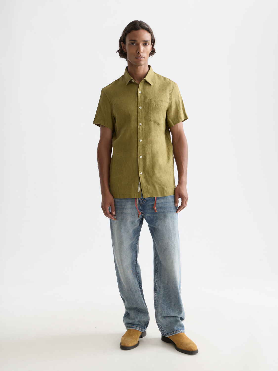 Light beige Scotch & Soda short-sleeved linen shirt with a classic collar and button front, displayed on a hanger.