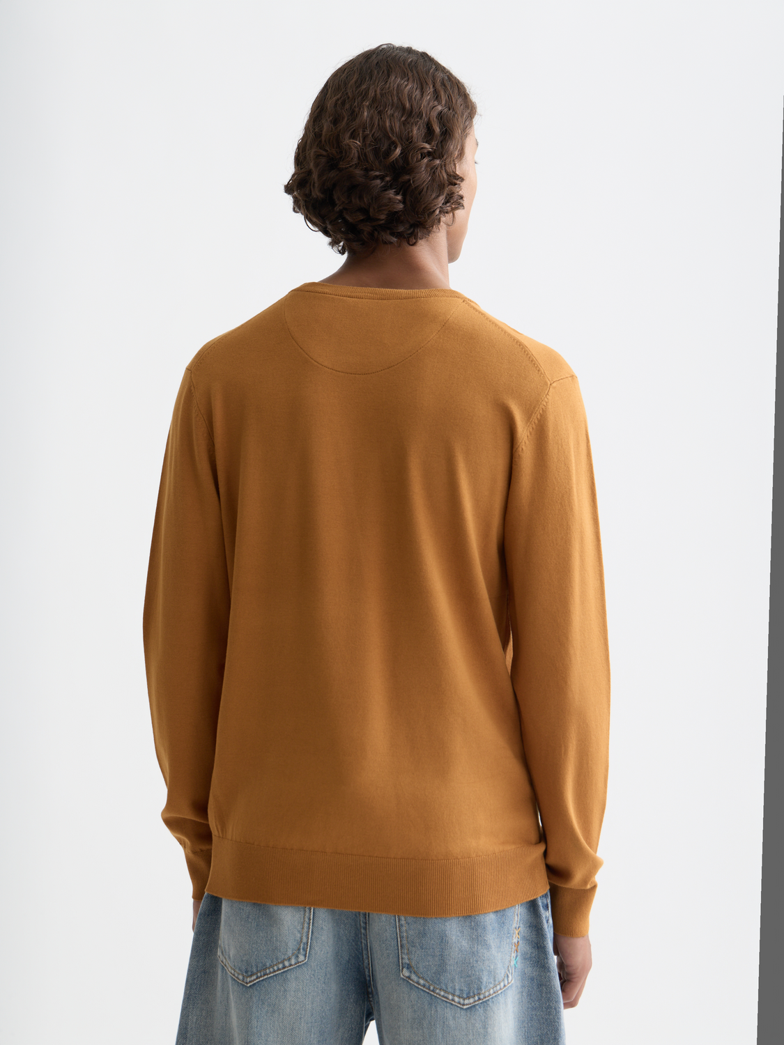 Black viscose knit pullover by Scotch & Soda, featuring a cozy, relaxed fit with ribbed cuffs and neckline.