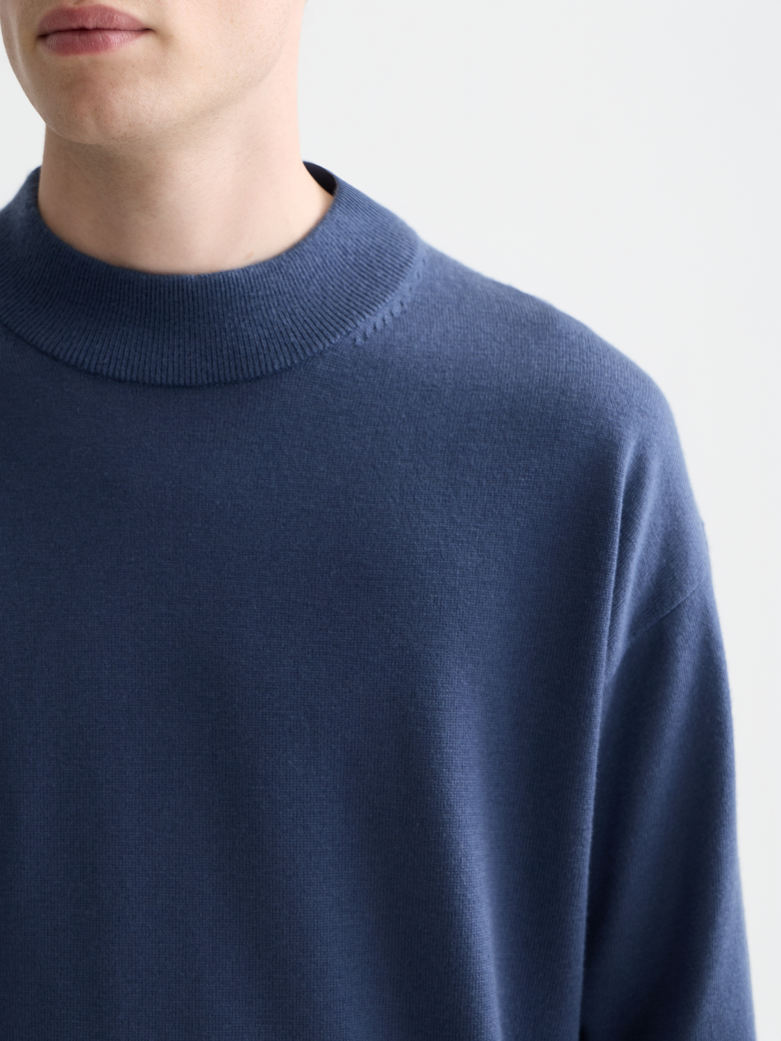 Scotch & Soda dropped shoulder mock neck knitwear in soft fabric, featuring a relaxed fit and stylish design.
