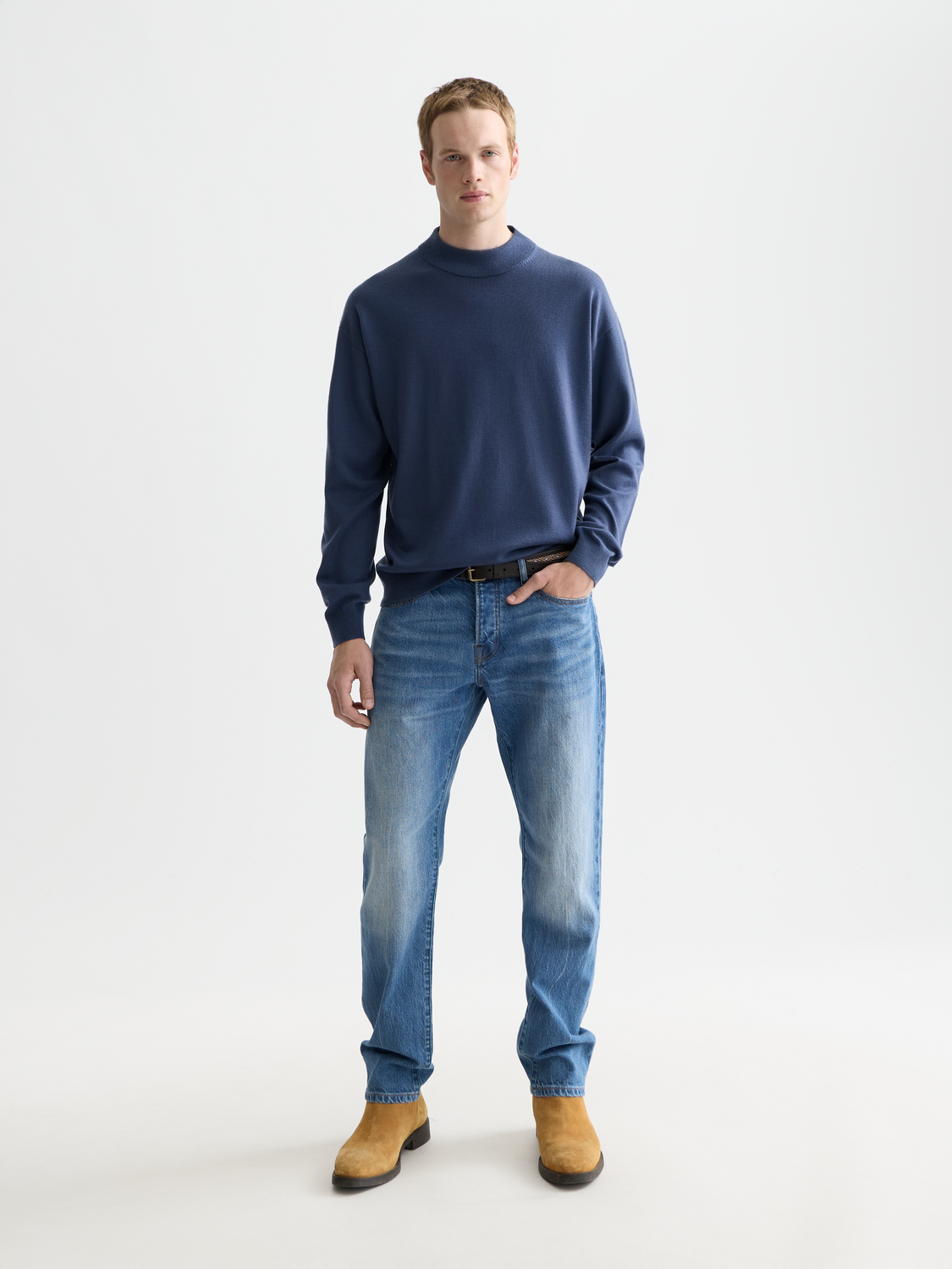 Scotch & Soda dropped shoulder knitwear with mock neck, featuring a relaxed fit and soft fabric in a neutral color.