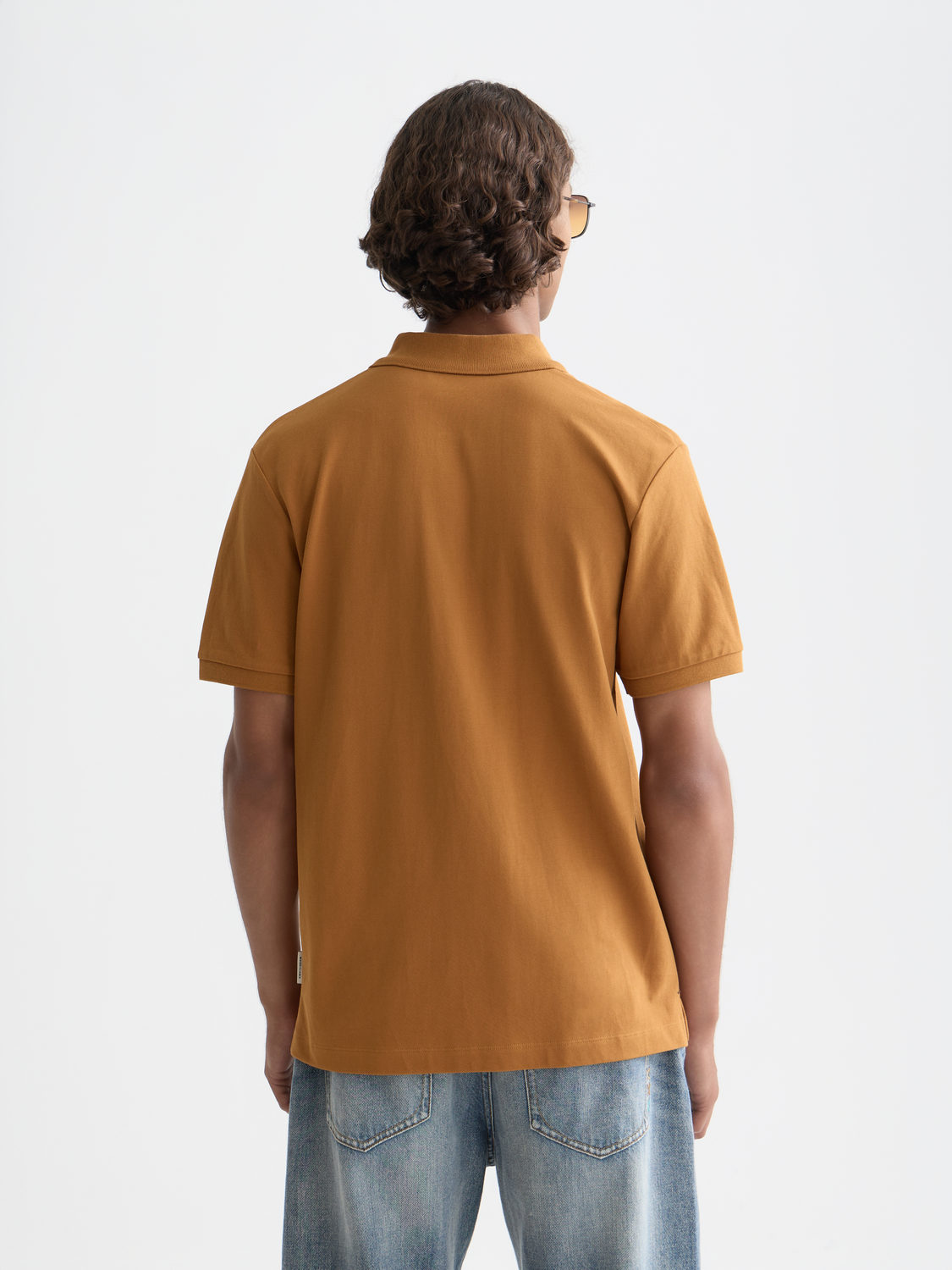 Scotch & Soda logo pique polo shirt in navy with collar and short sleeves, front view.