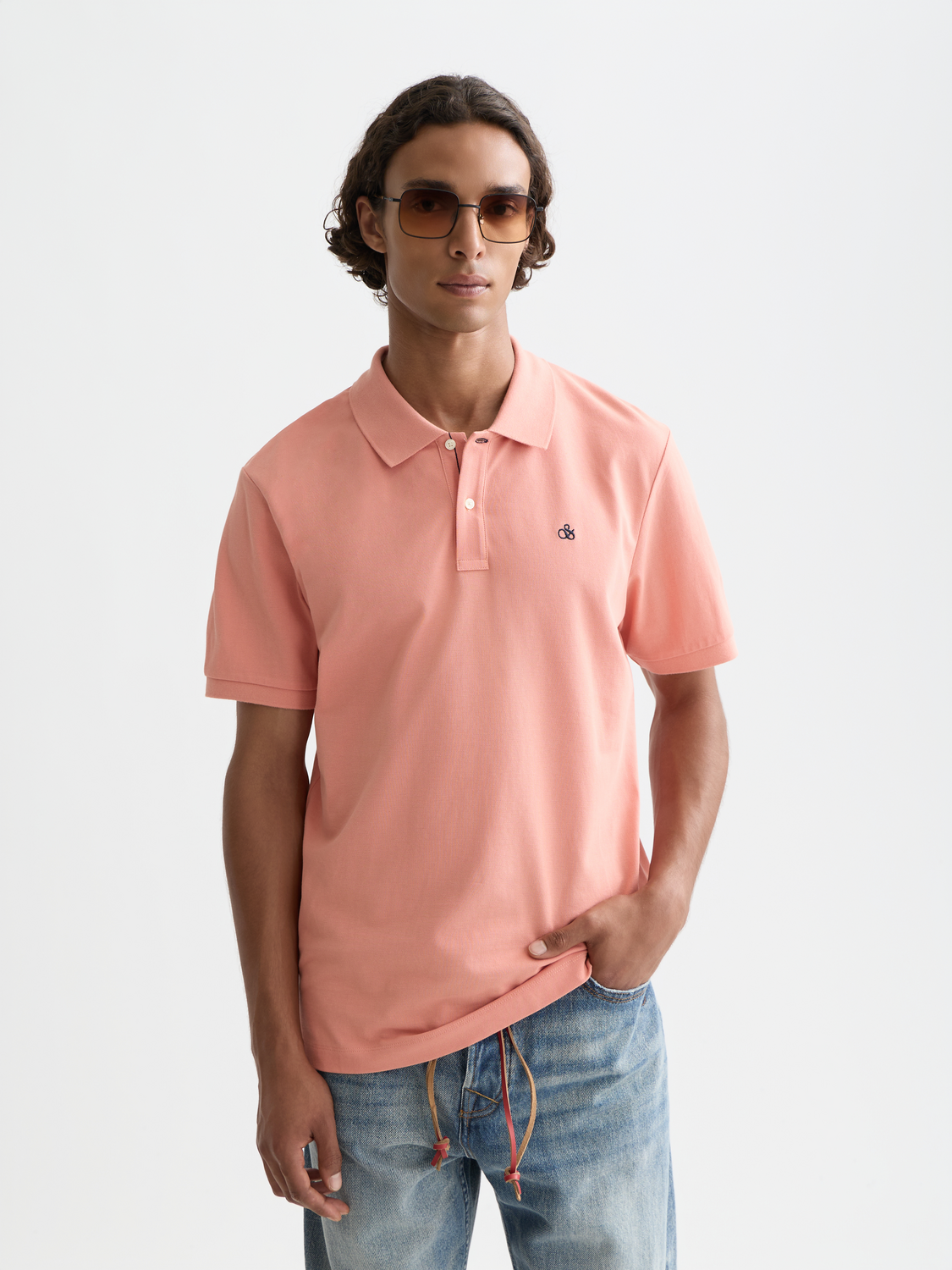 Scotch & Soda logo pique polo shirt in crimson with a classic collar and short sleeves, displayed on a white background.