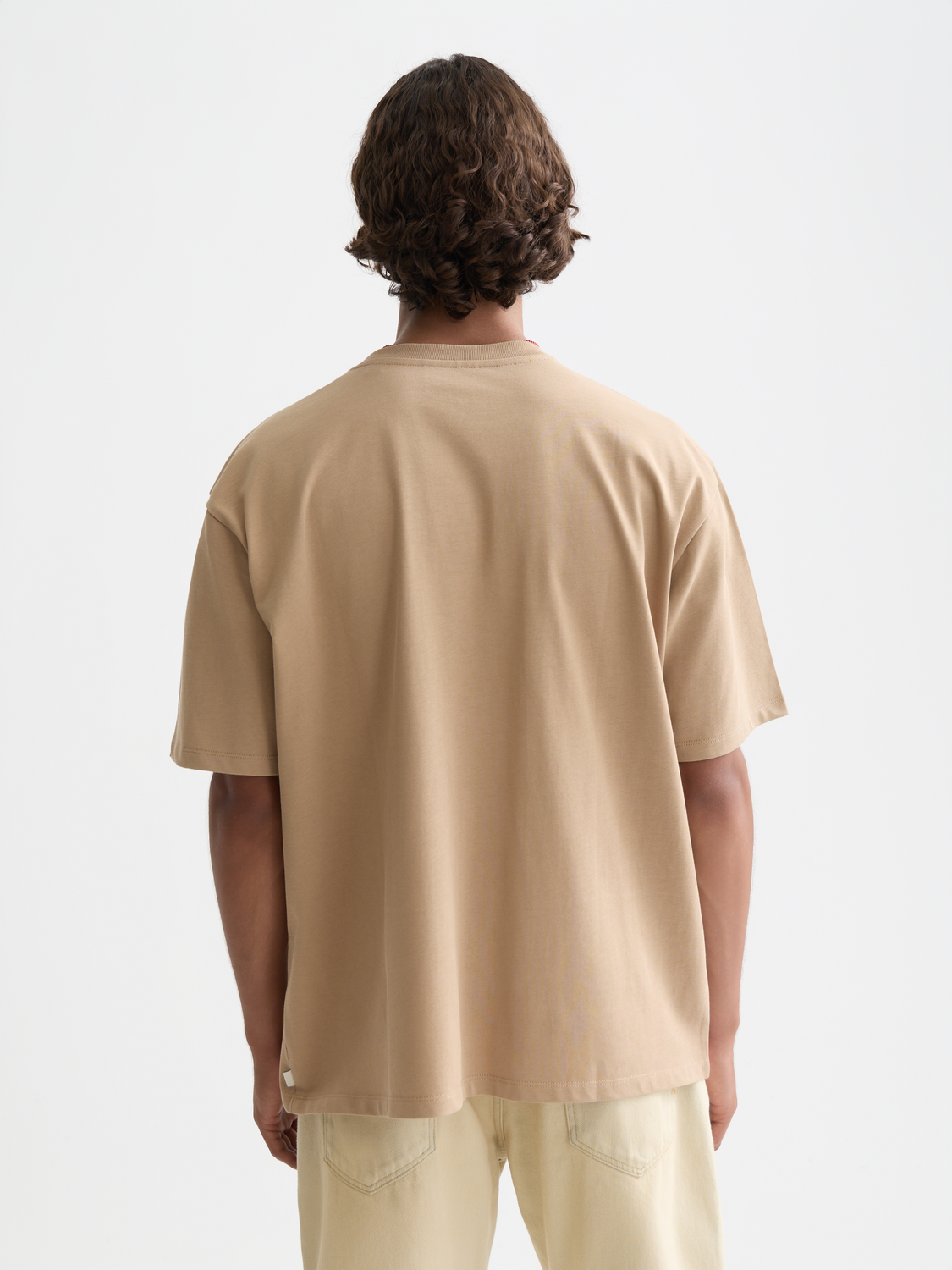 Light blue Scotch & Soda short-sleeve t-shirt with chest pocket, casual style, front view.