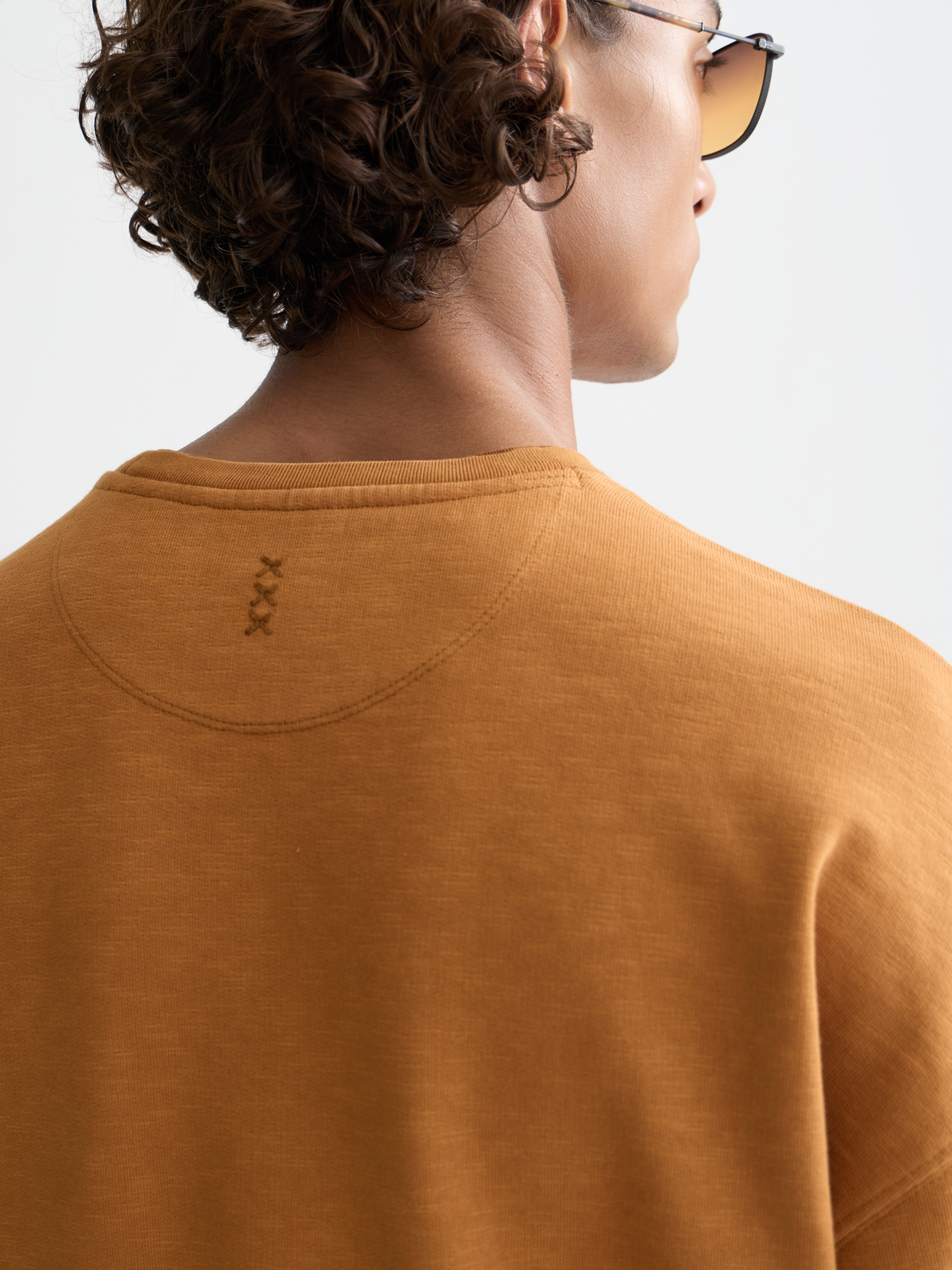 SCOTCH & SODA 3 crosses sweatshirt featuring a relaxed fit and soft fabric, shown in a front view with a casual style.