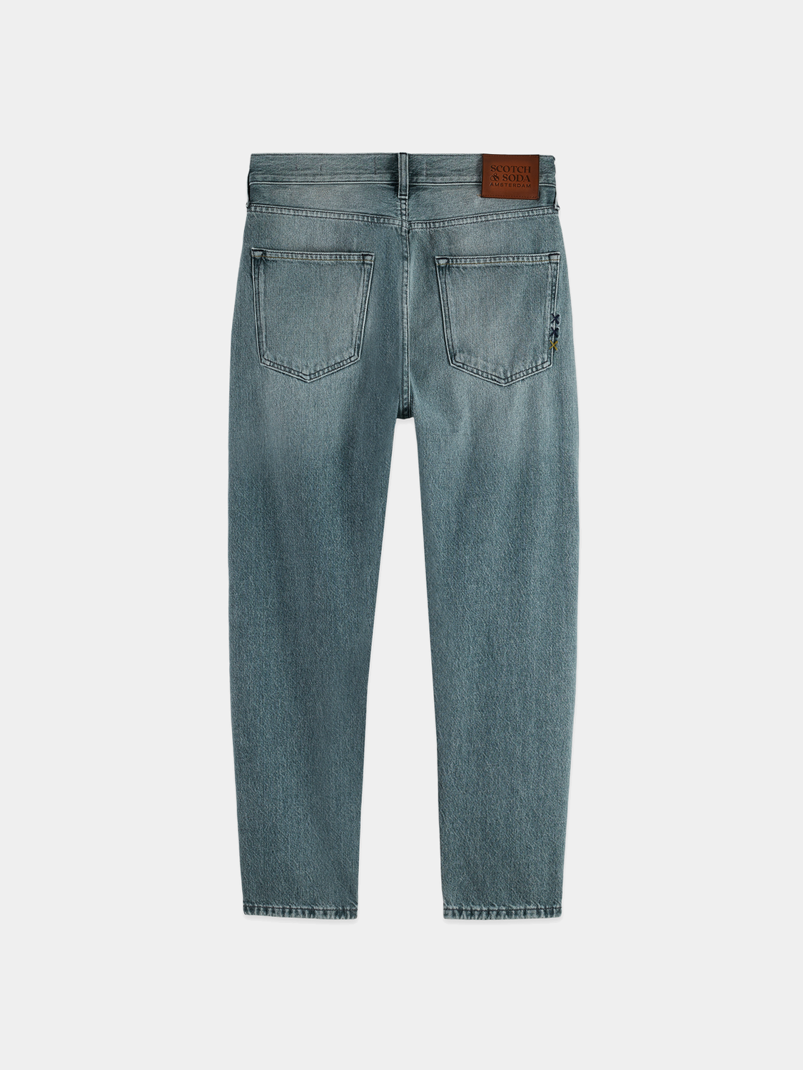 Dark blue Scotch & Soda Dean tapered denim jeans with a slim fit and classic five-pocket design.