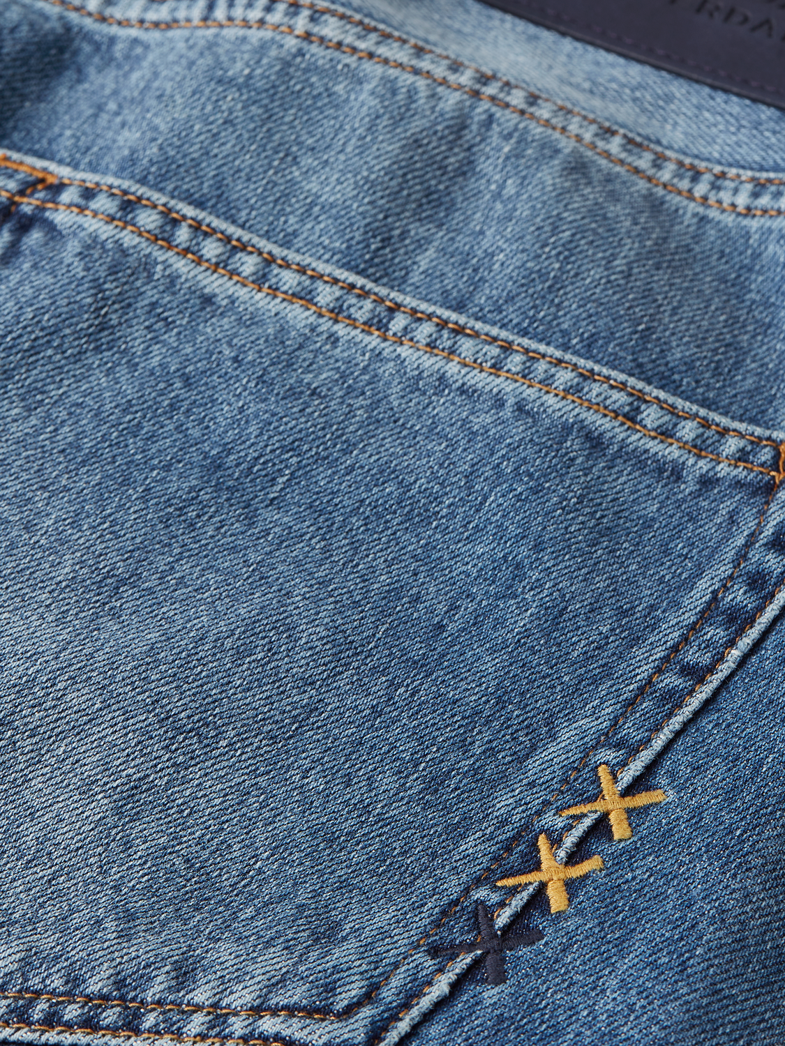 SCOTCH & SODA Dean tapered denim jeans showing slim fit design and classic five-pocket styling.