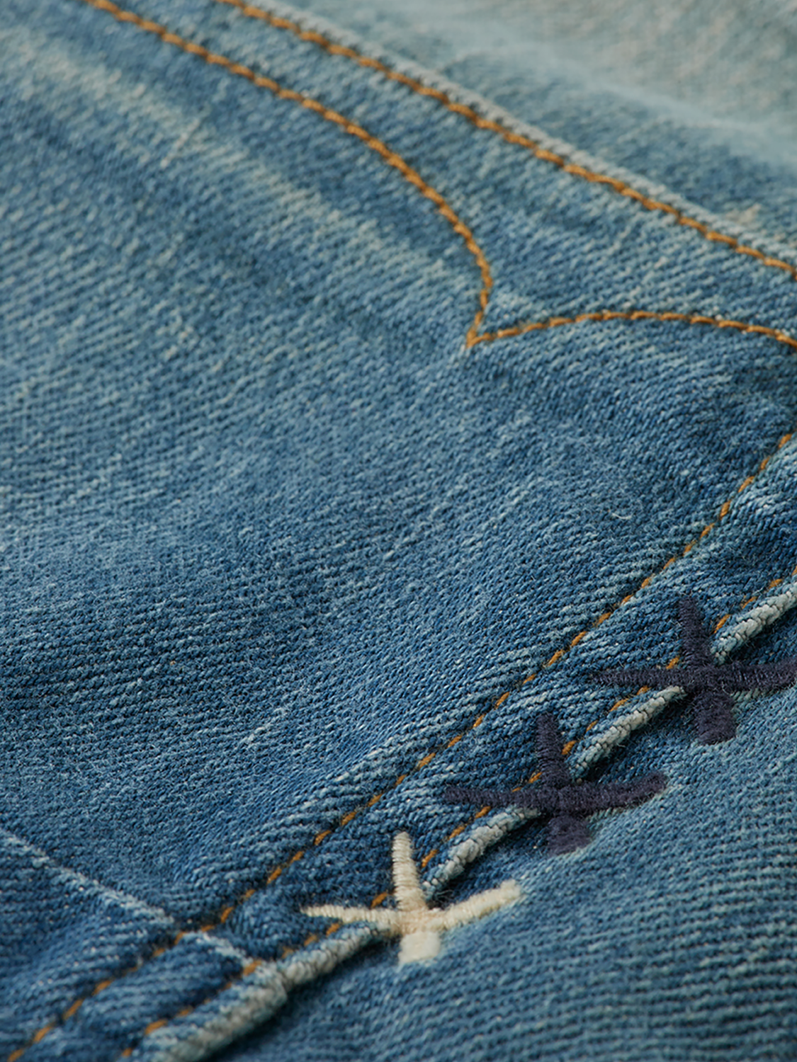 Slim-fit Ralston denim jeans by Scotch & Soda, showing classic five-pocket design and dark wash fabric.
