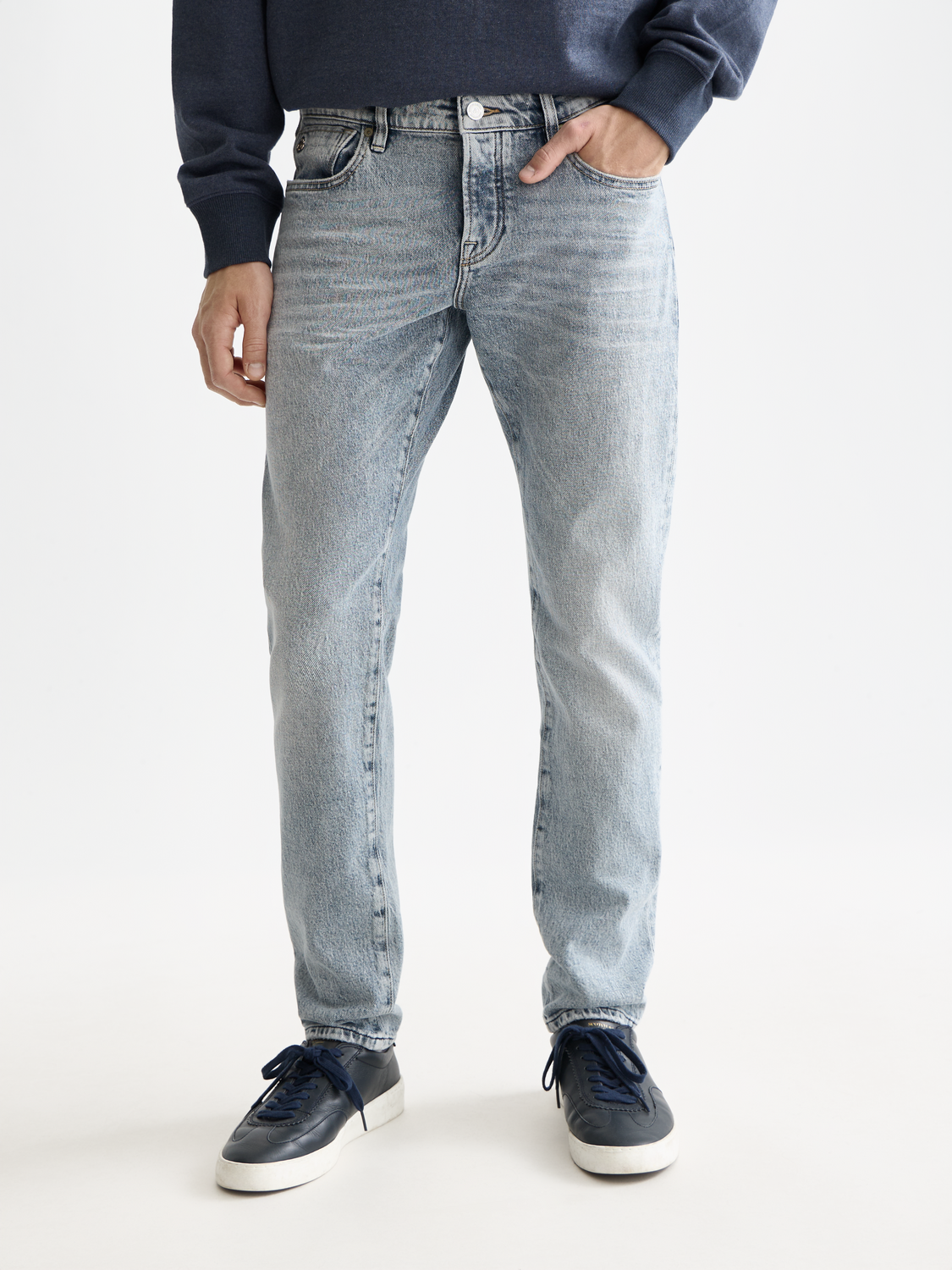 Slim-fit denim jeans by Scotch & Soda featuring classic five-pocket design and modern cut in a dark wash.