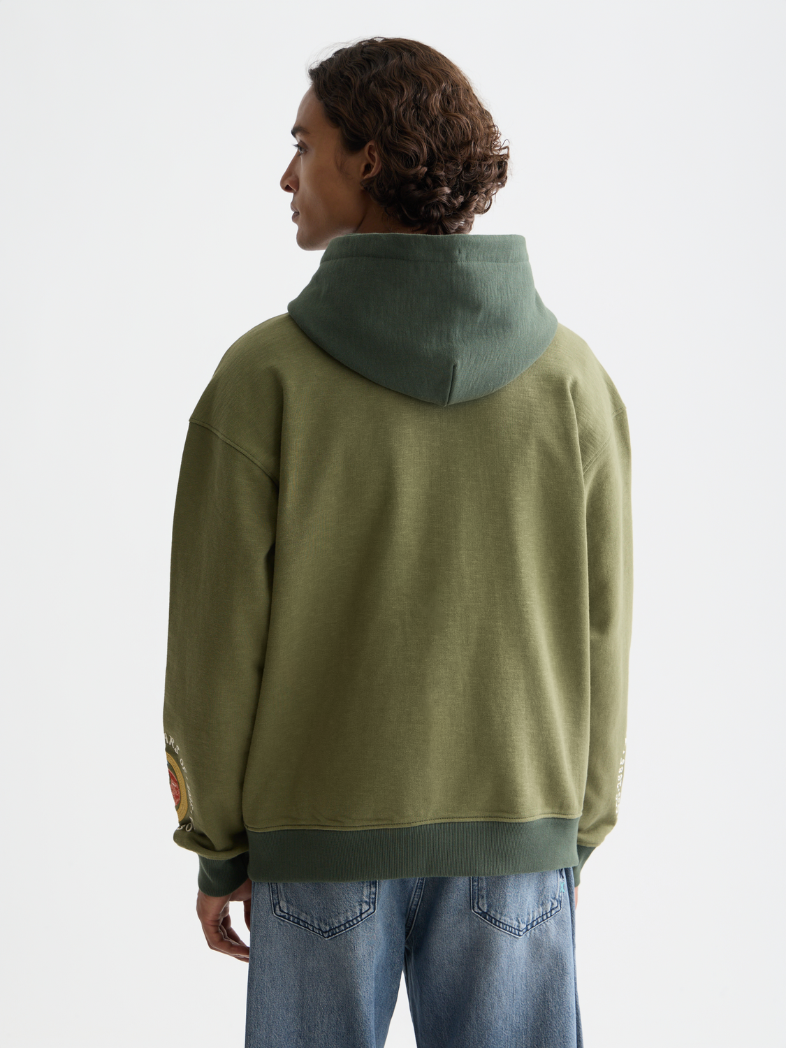 Embroidered hoodie from Scotch & Soda, casual sweats with detailed stitching, front view showing embroidery design.