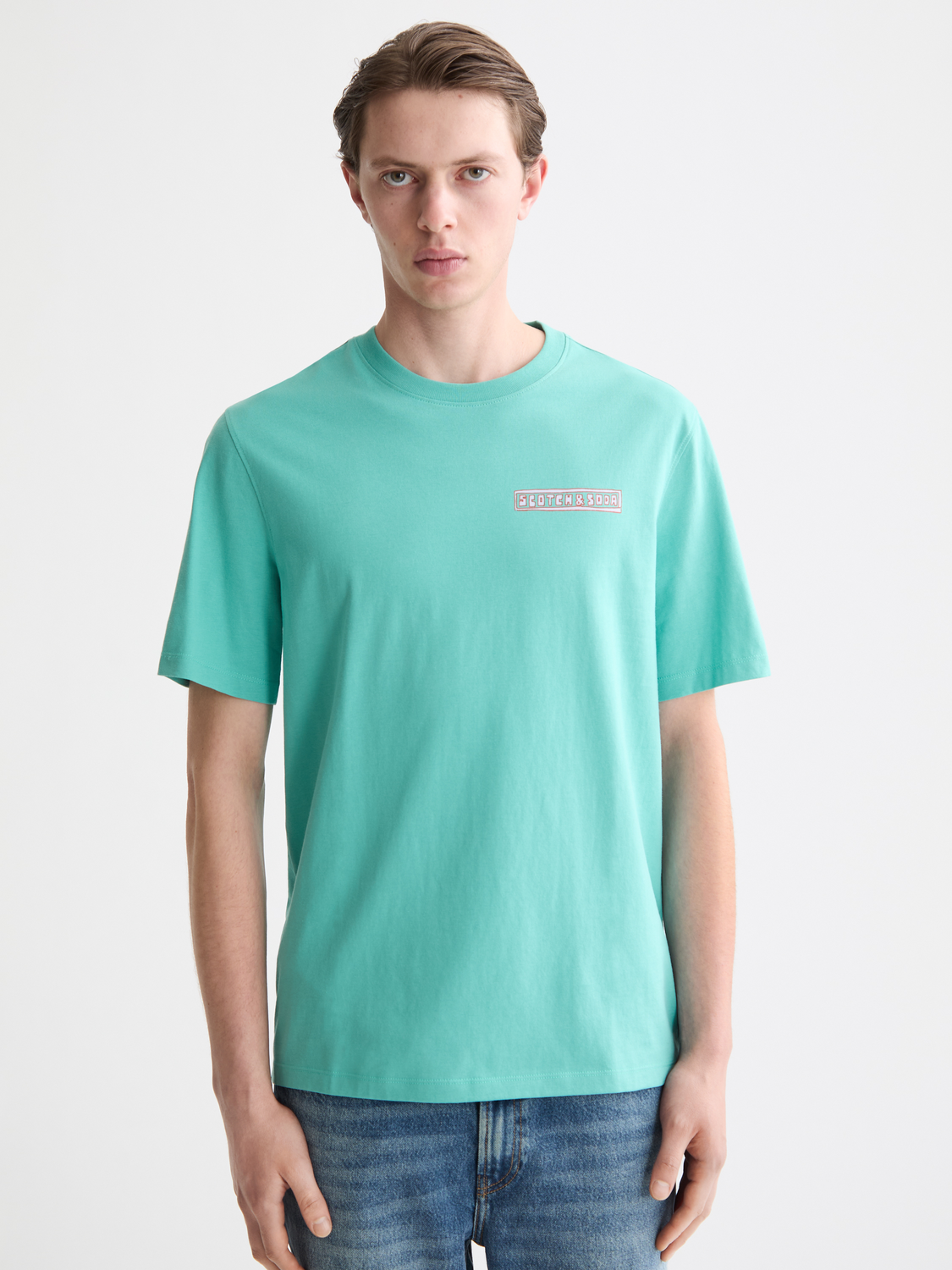 Scotch & Soda short sleeve artwork t-shirt featuring a colorful graphic print on a casual cotton tee.