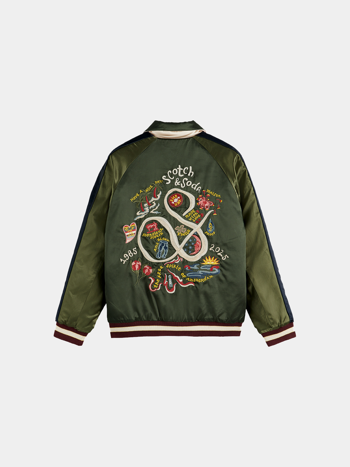 Reversible souvenir bomber jacket by Scotch & Soda with colorful patchwork design and ribbed cuffs, casual streetwear style.