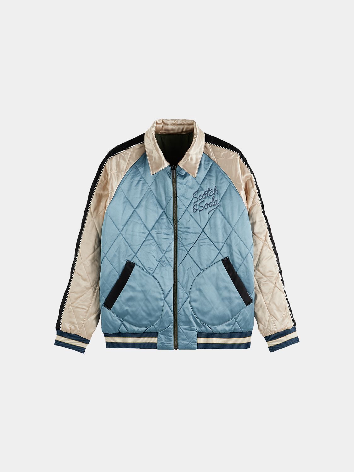 Reversible souvenir bomber jacket by Scotch & Soda featuring colorful patterns and casual style, shown on a hanger.