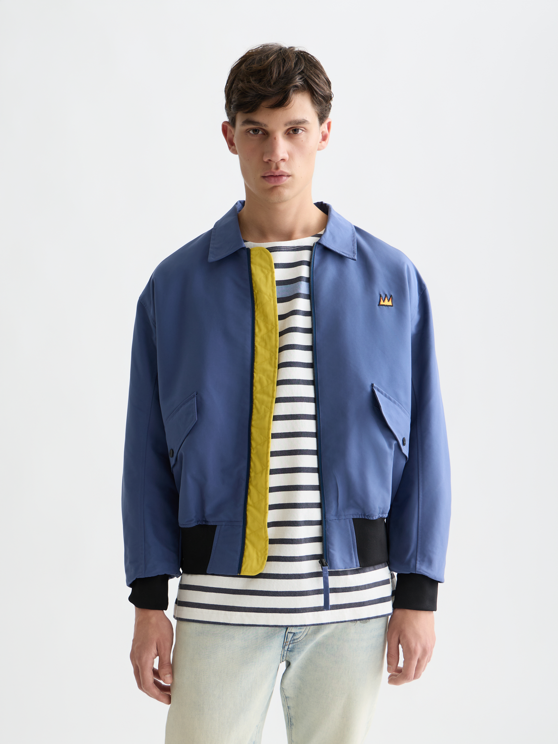 SCOTCH & SODA S&S x Basquiat souvenir jacket with vibrant artwork, front view showcasing bold graphic design and detailed embroidery.