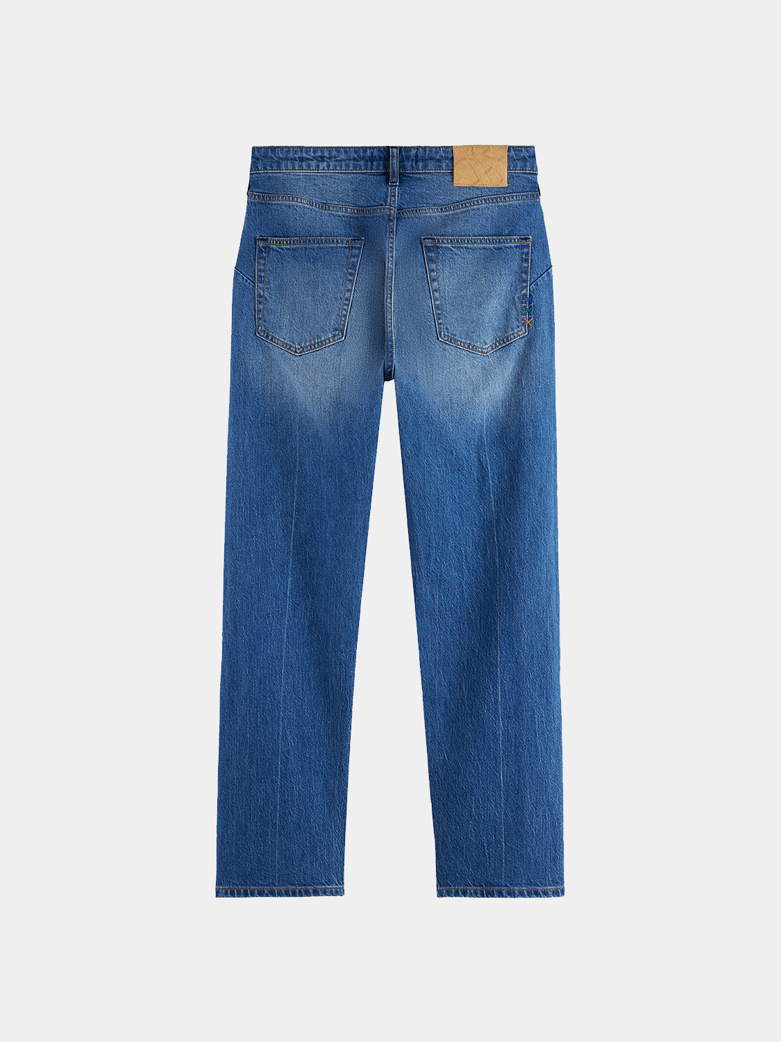 Dark blue Scotch & SODA Zee straight-fit denim jeans laid flat, showing classic five-pocket design and clean stitching.