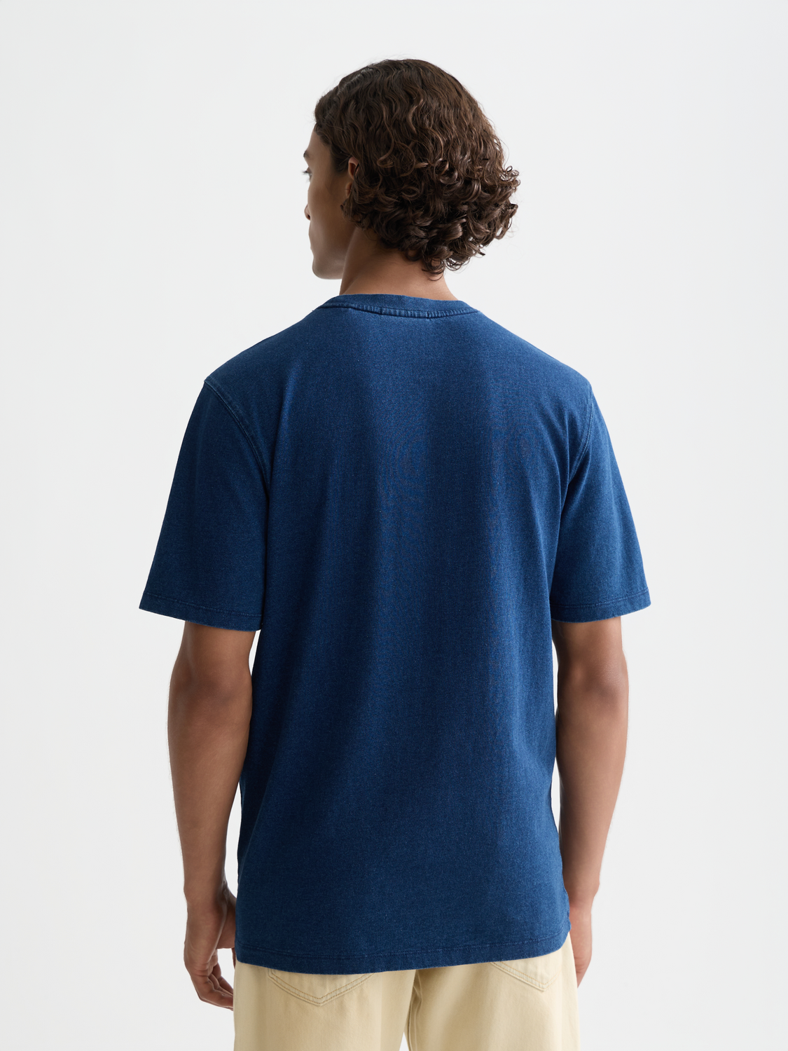 Blue embroidered indigo Scotch & Soda short-sleeve t-shirt with detailed embroidery on the front.