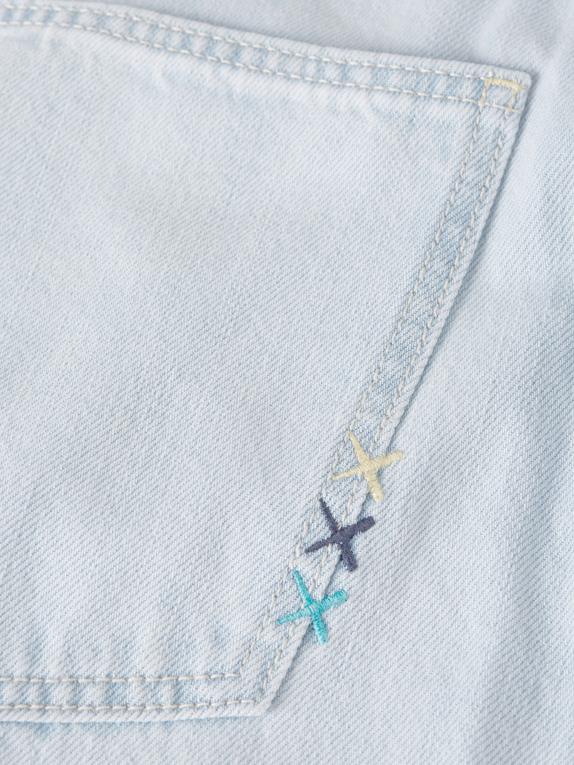 Scotch & Soda Dean tapered denim jeans with classic five-pocket design and faded wash, displayed on a neutral background.