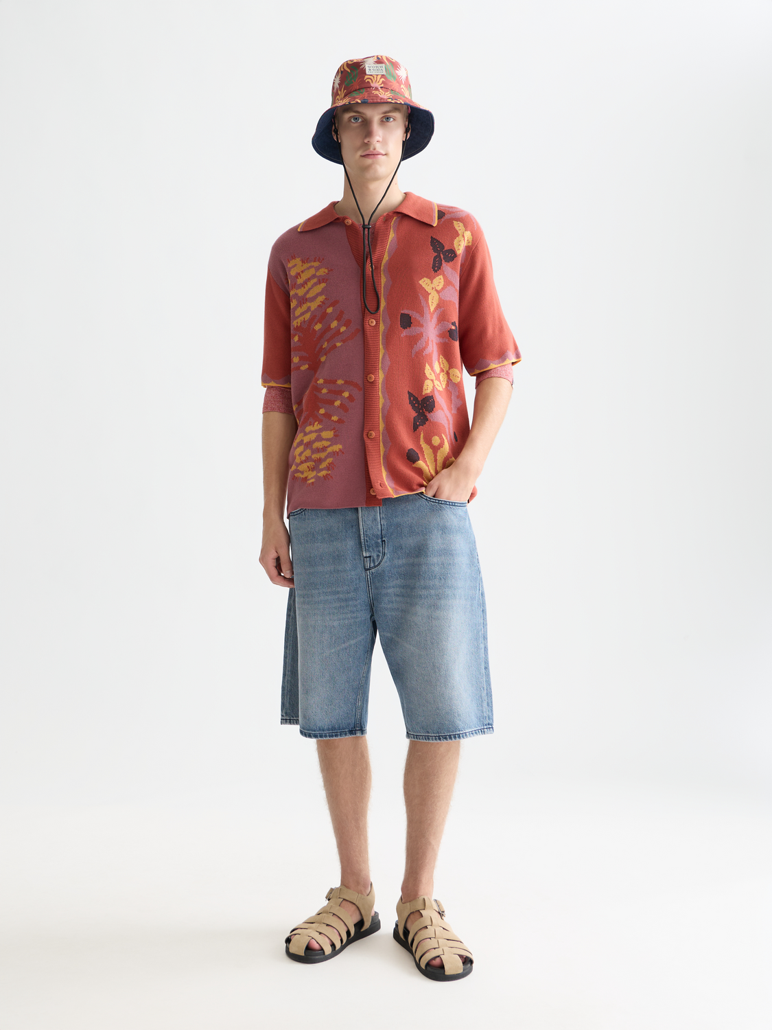 Light blue denim shorts from Scotch & Soda with a loose fit and casual style, front view showing classic five-pocket design.