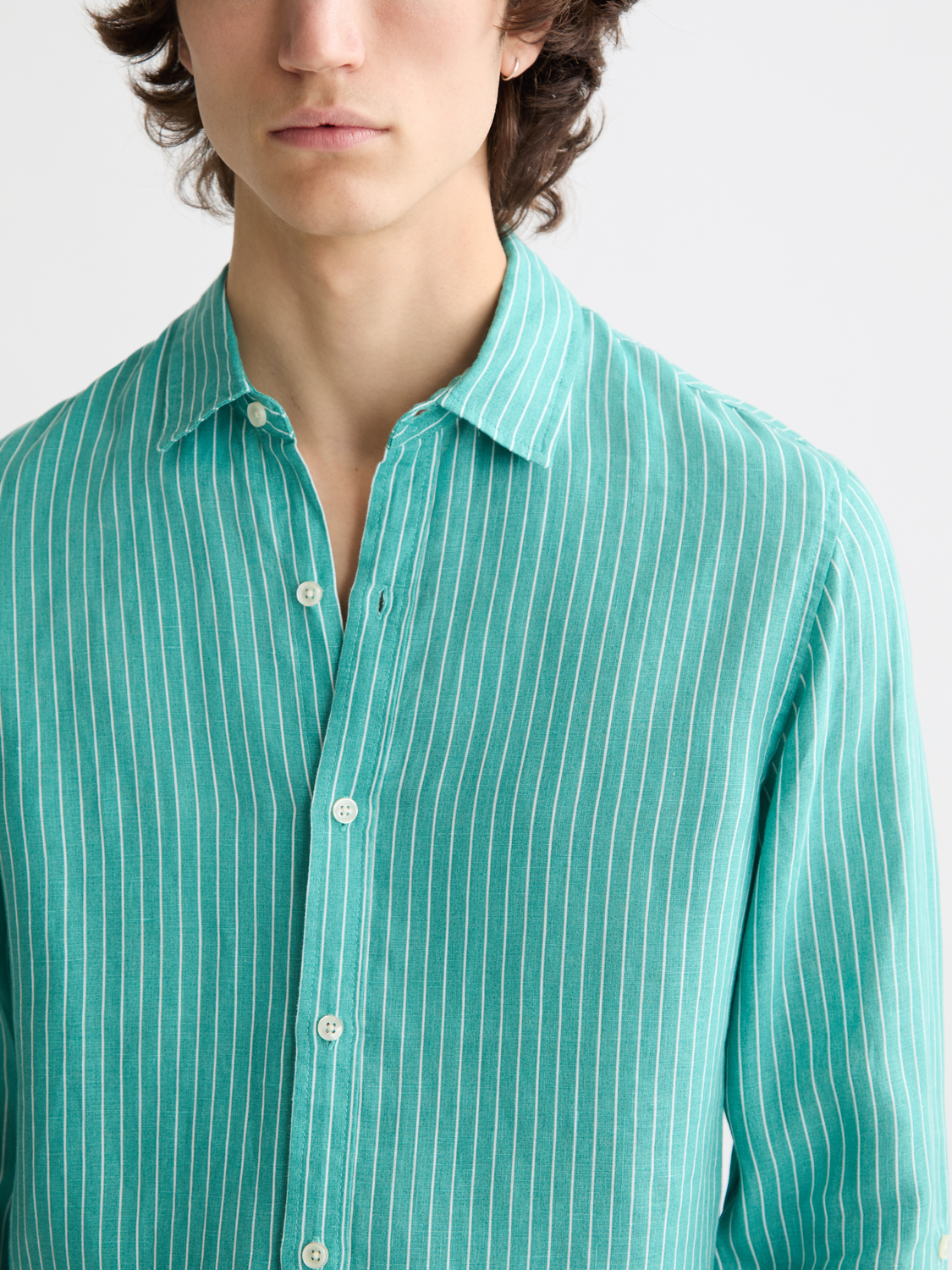 Striped linen long-sleeve shirt by Scotch & Soda featuring a relaxed fit and classic design.